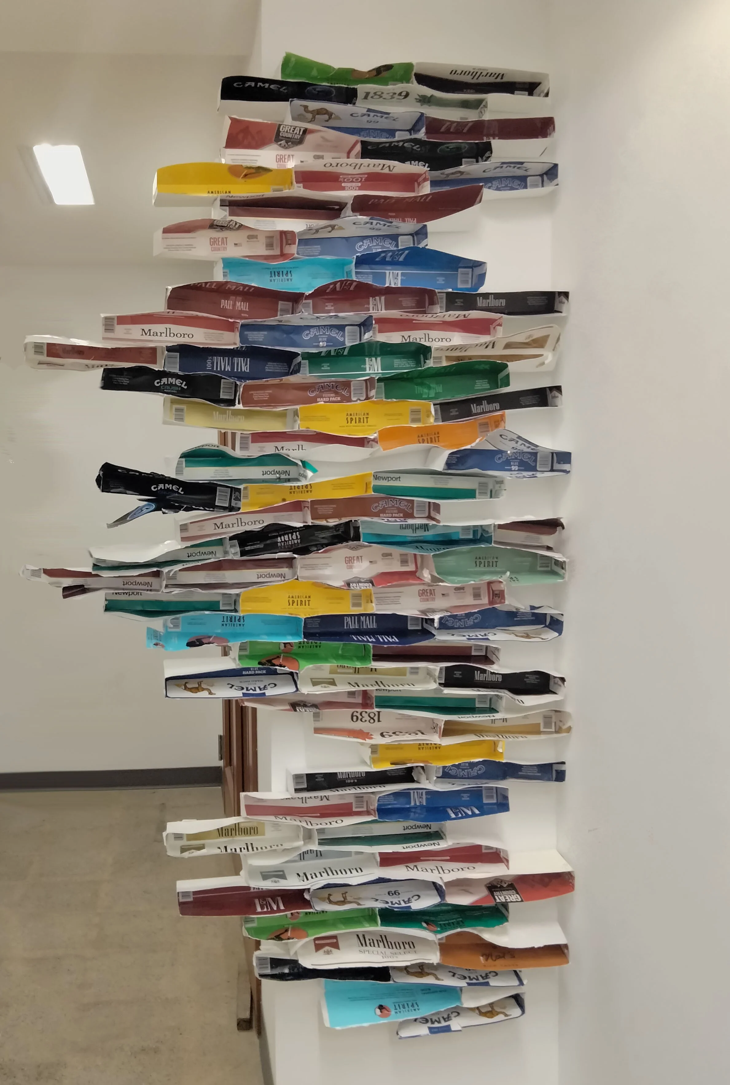 "Inhale"


found object installation
cigarette cartons, glue
dimensions vary