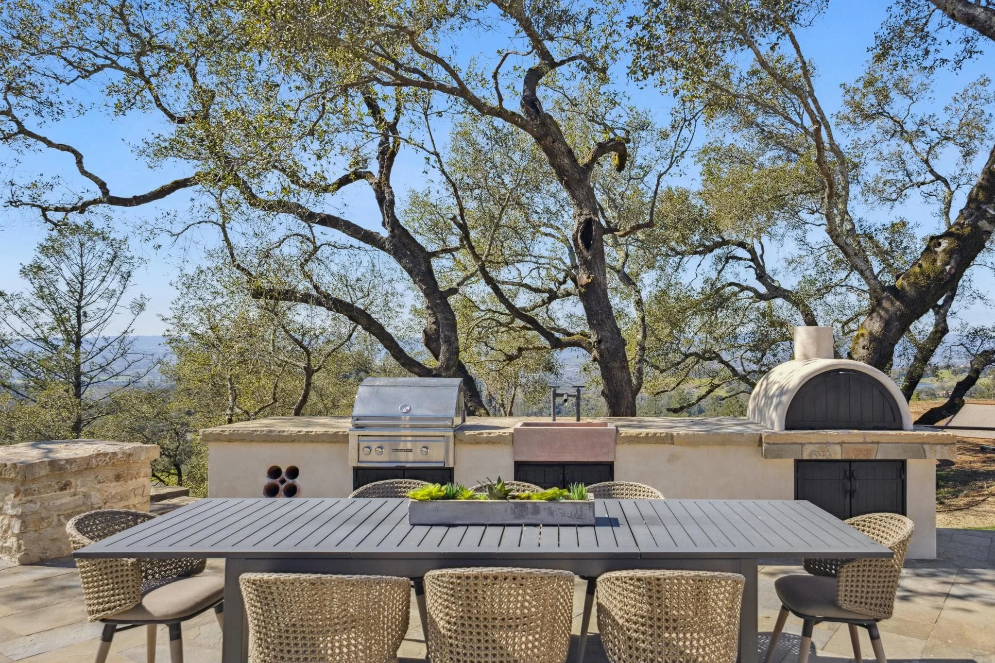 Outdoor+Kitchen+design+historical+europeanstyle+stone+limestone+california+dining.jpeg
