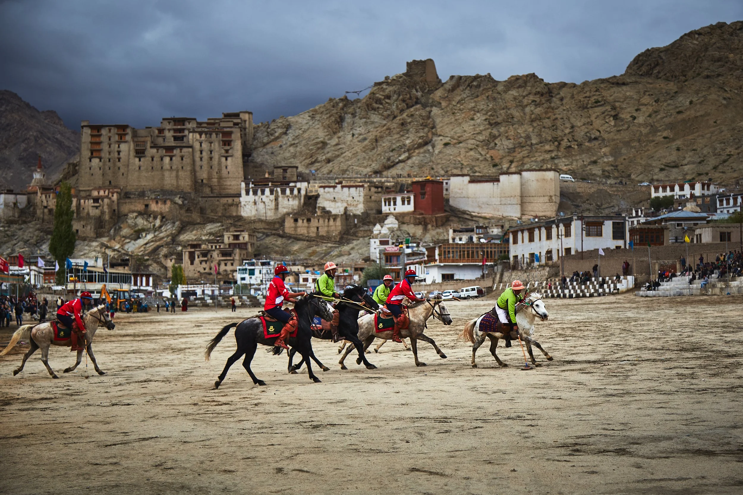 The Polo game is full swing at Leh ground with the Leh Palace over the hills. Polo is brought into the region after a 17th-century marriage between the king of Ladakh and the princess from Baltistan, in Pakistan-administered Kashmir.