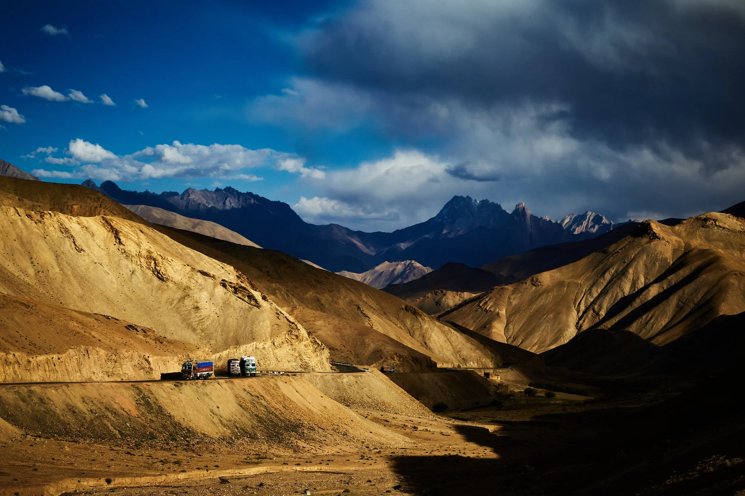 Transport vehicles are navigating their way through the rough terrain towards Srinagar. Steep mountain ranges and rocky hills are part of the majority of the landscapes in Ladakh. These, along with the underdeveloped road system, make parts of this r