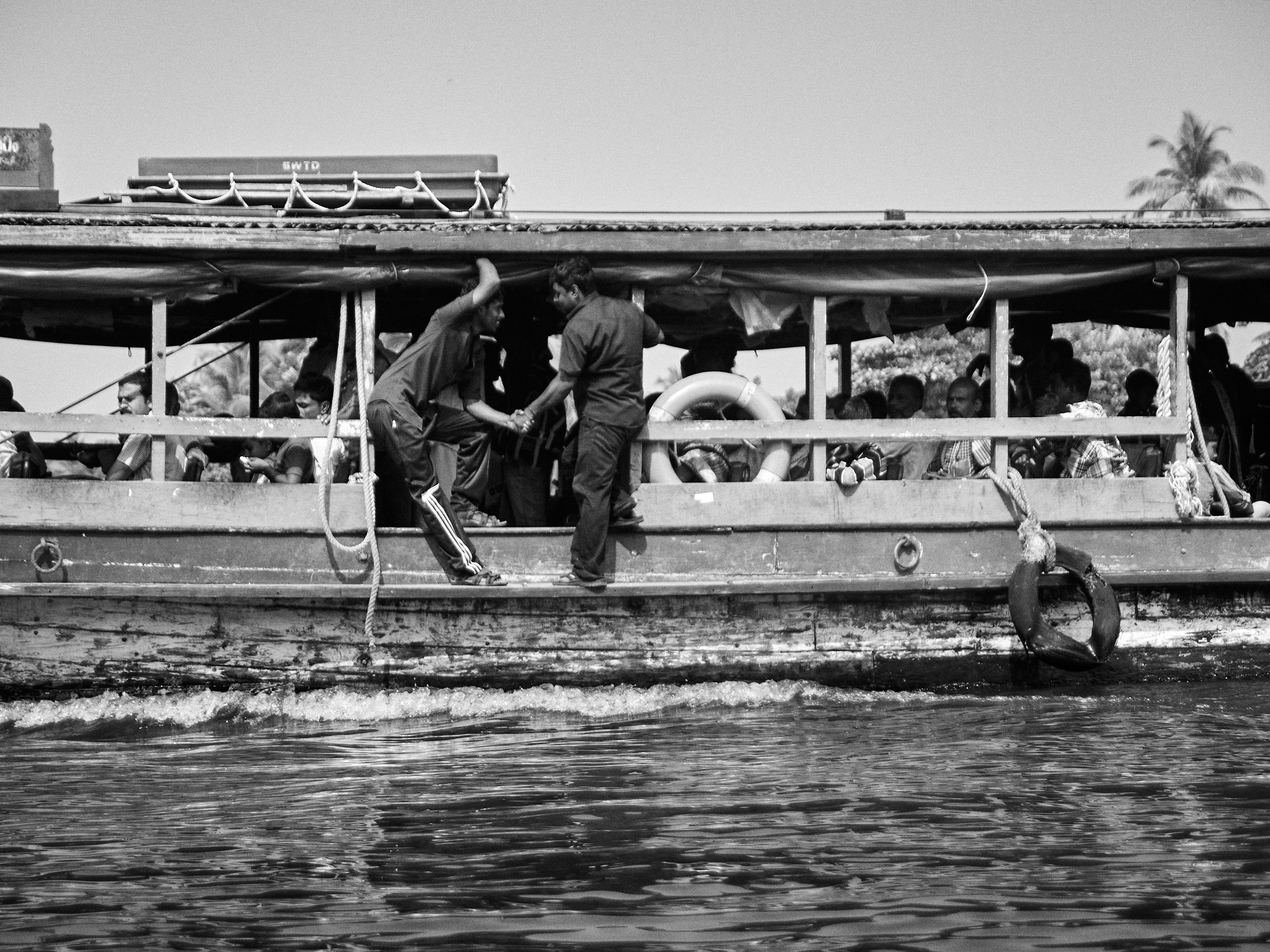 Passenger boats are a common mode of transport between the small pockets of land mass in the Allapuzha backwaters.
