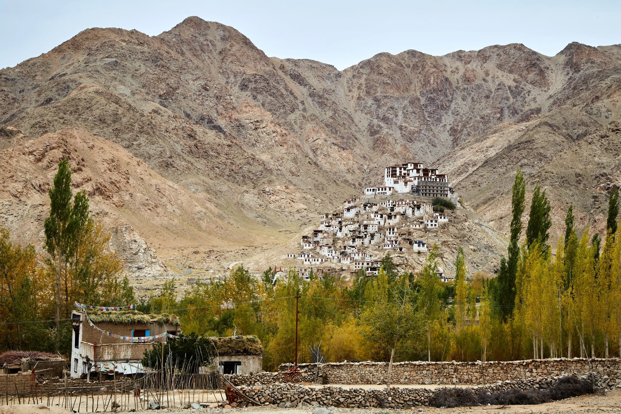 Chemrey monastery sitting on top of a hill overlooking the village. These massive complexes can accommodate hundreds of followers and monks at a time.