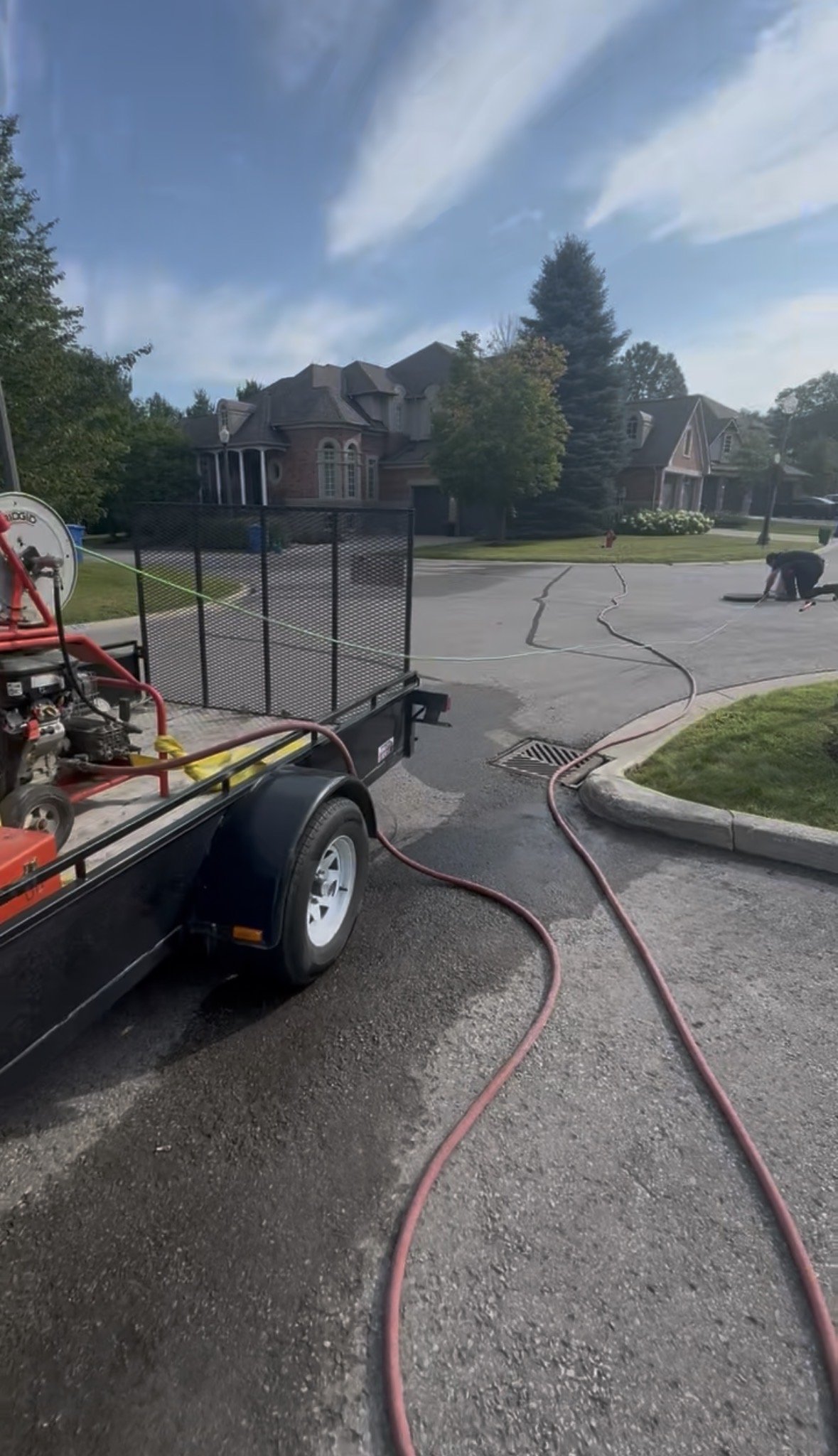 MJ Plumbing LTD completing hydro jetting services for a housing complex in Aurora