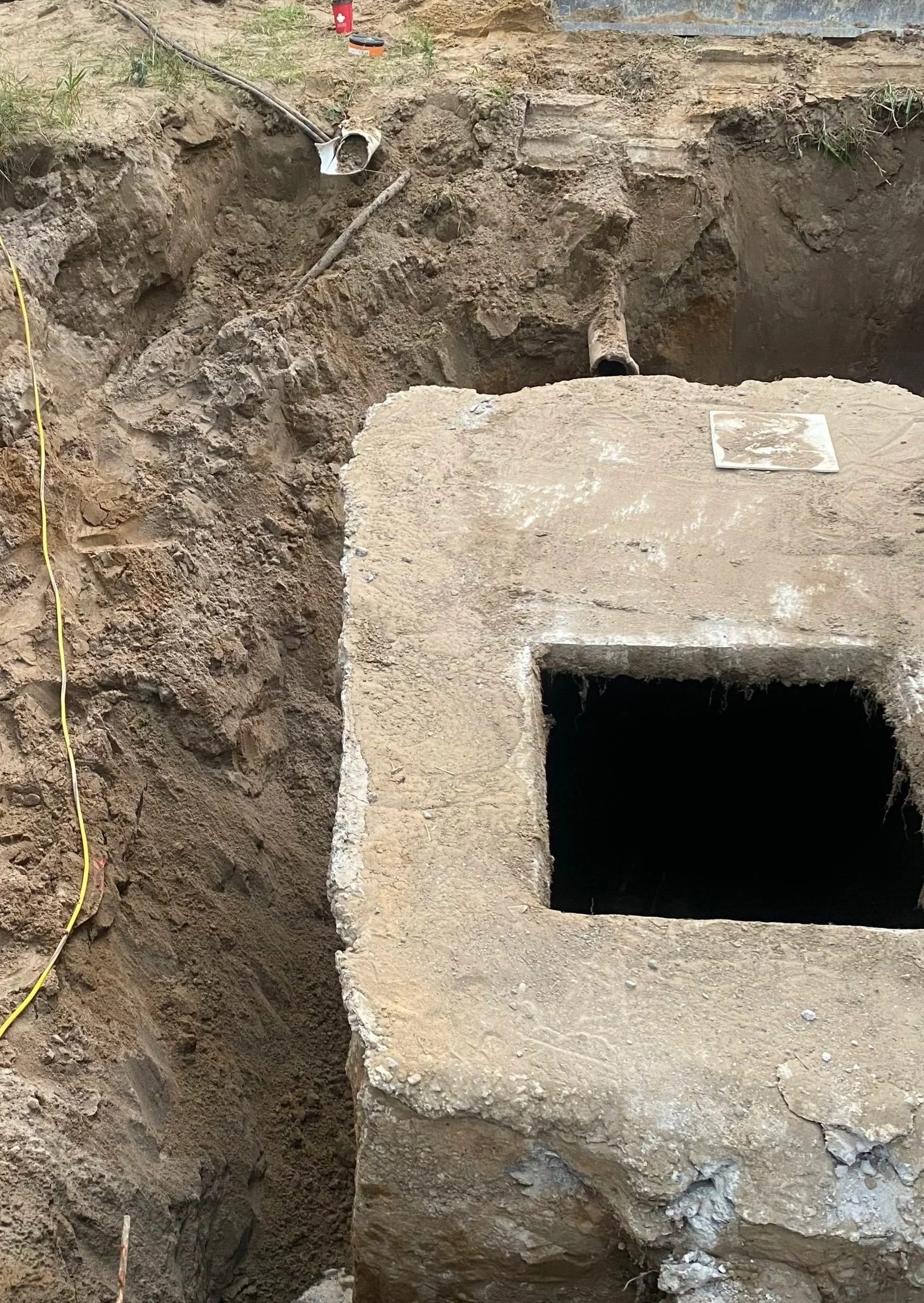 Old septic tank removed as part of a new system design and installation project