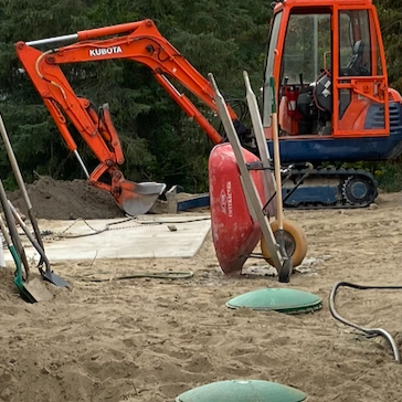 Kubota excavator on septic system installation site in York Region Ontario