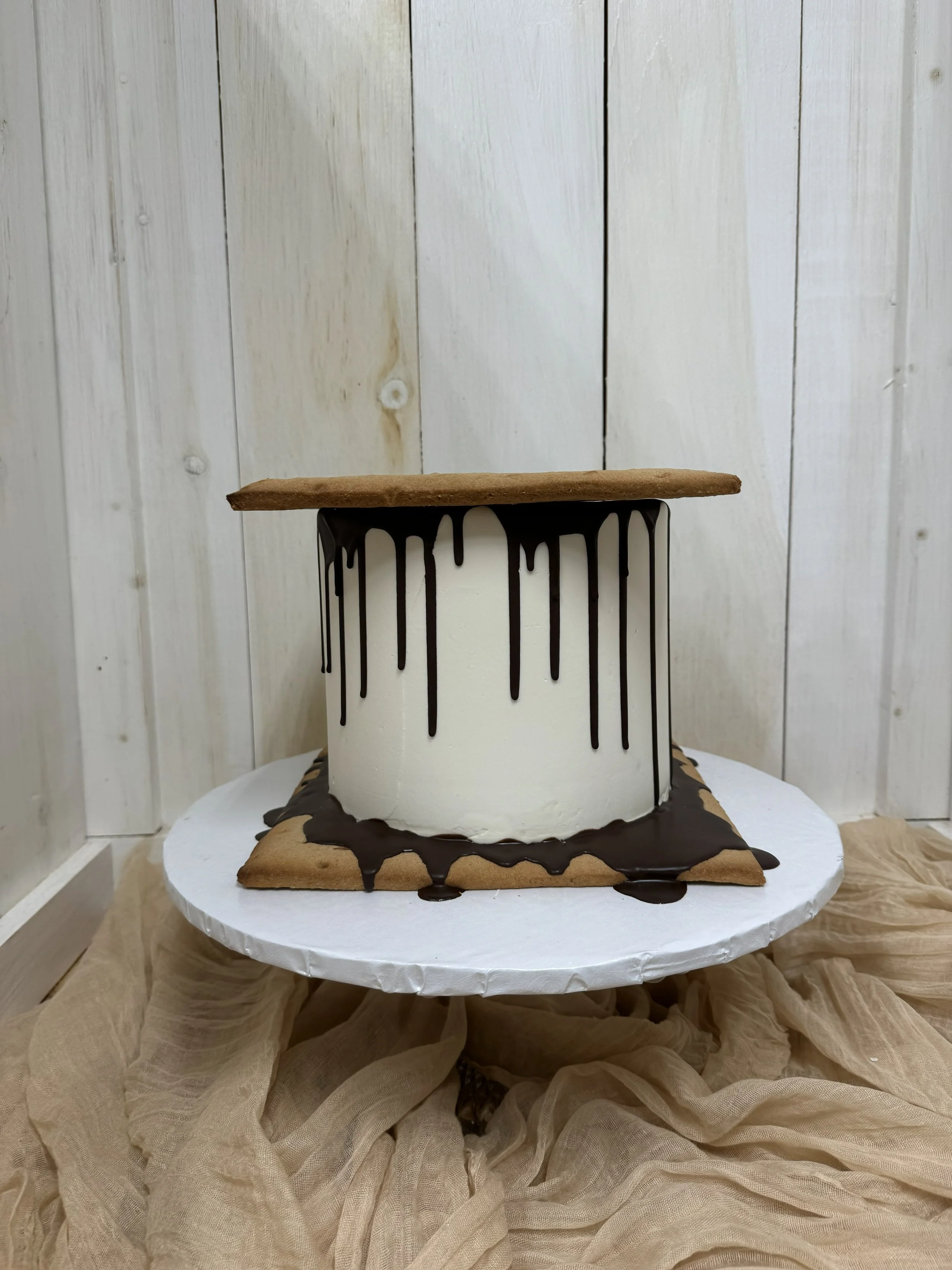 smores first birthday smash cake.jpeg