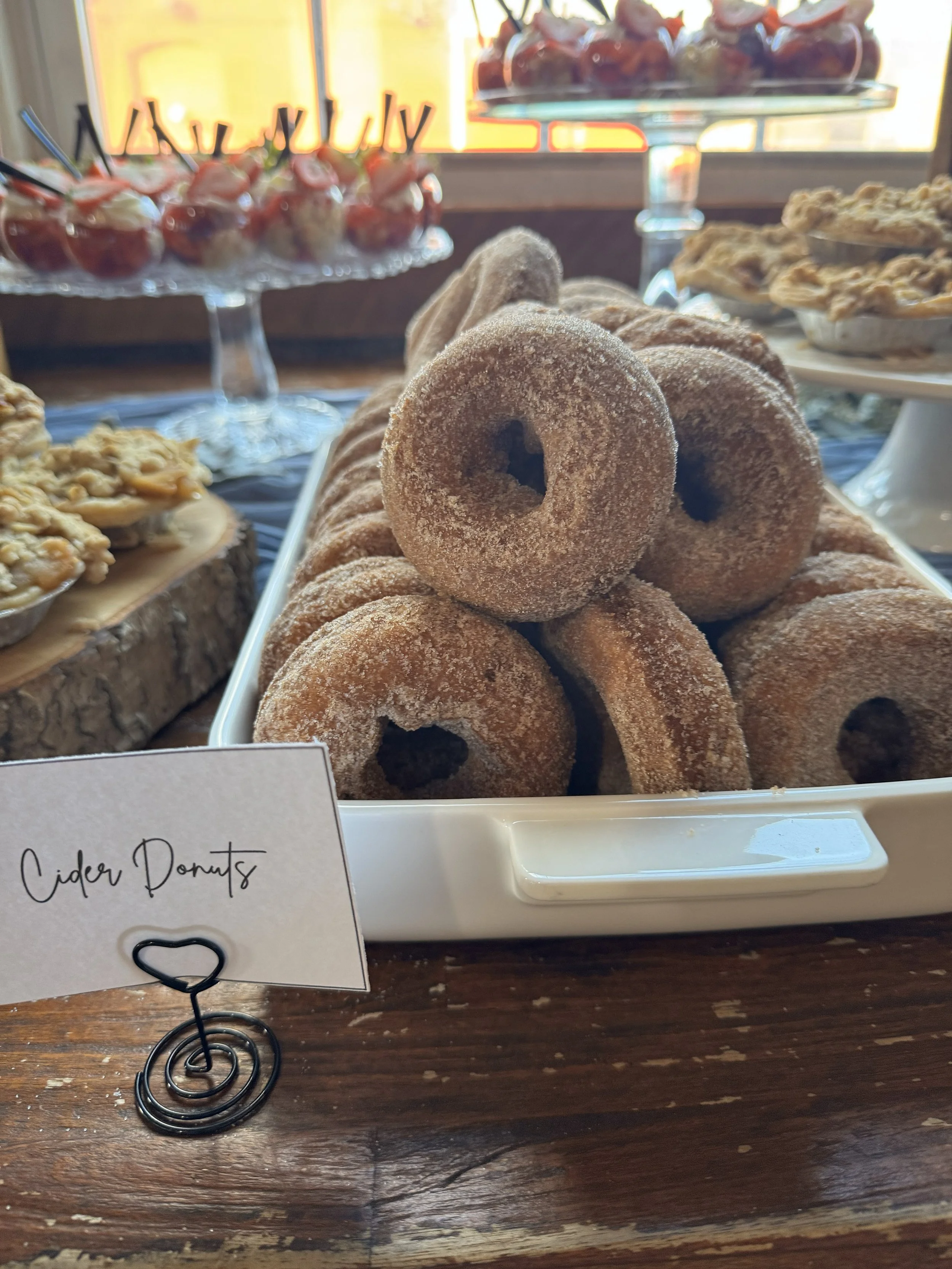 mattie and tristans modern industrial loft wedding the guild pawtucket rhode island dessert table mountain wedding cake cider donuts.jpeg