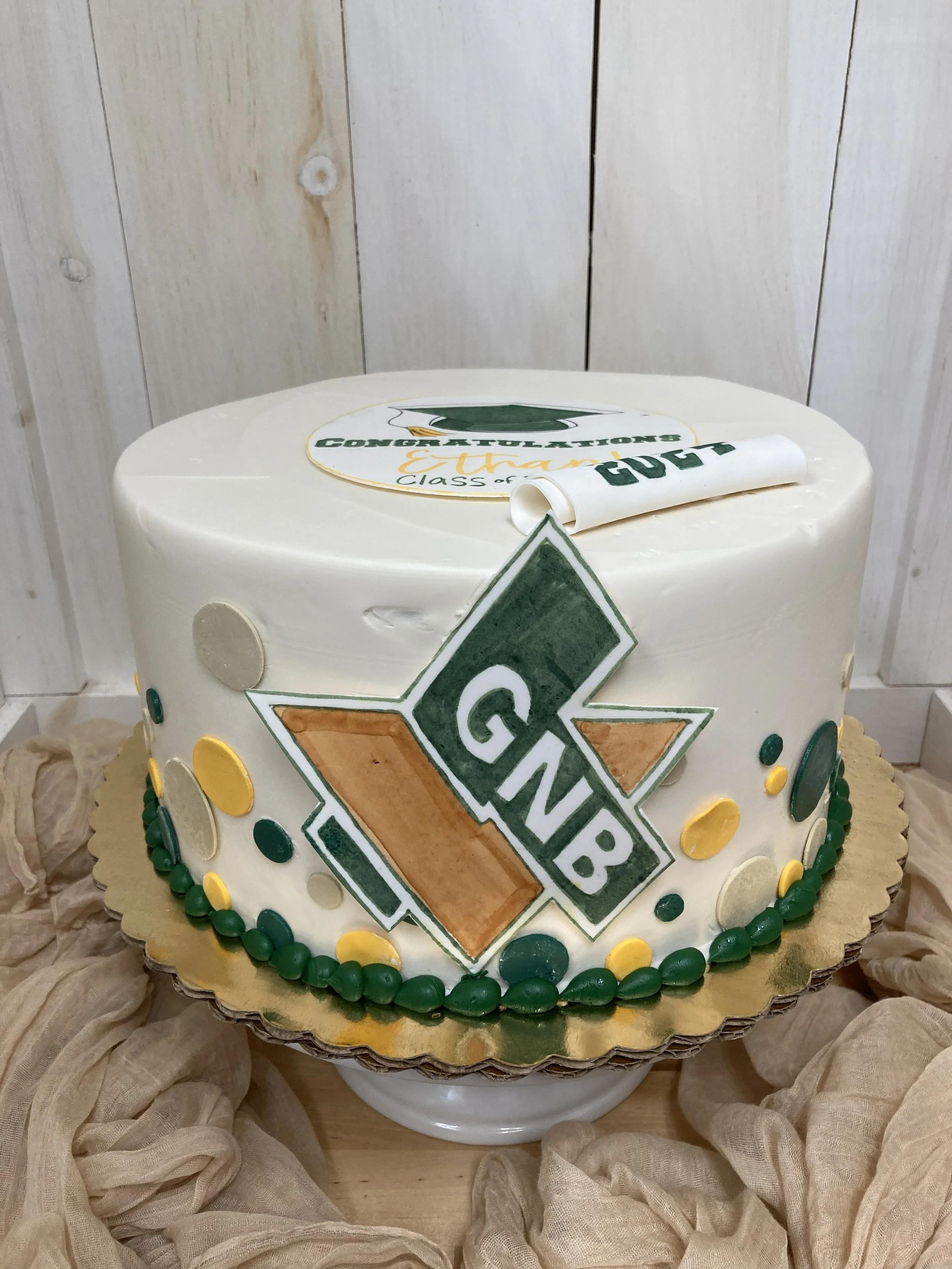 GNBVTHS new bedford graduation cake green yellow gold cake.jpg