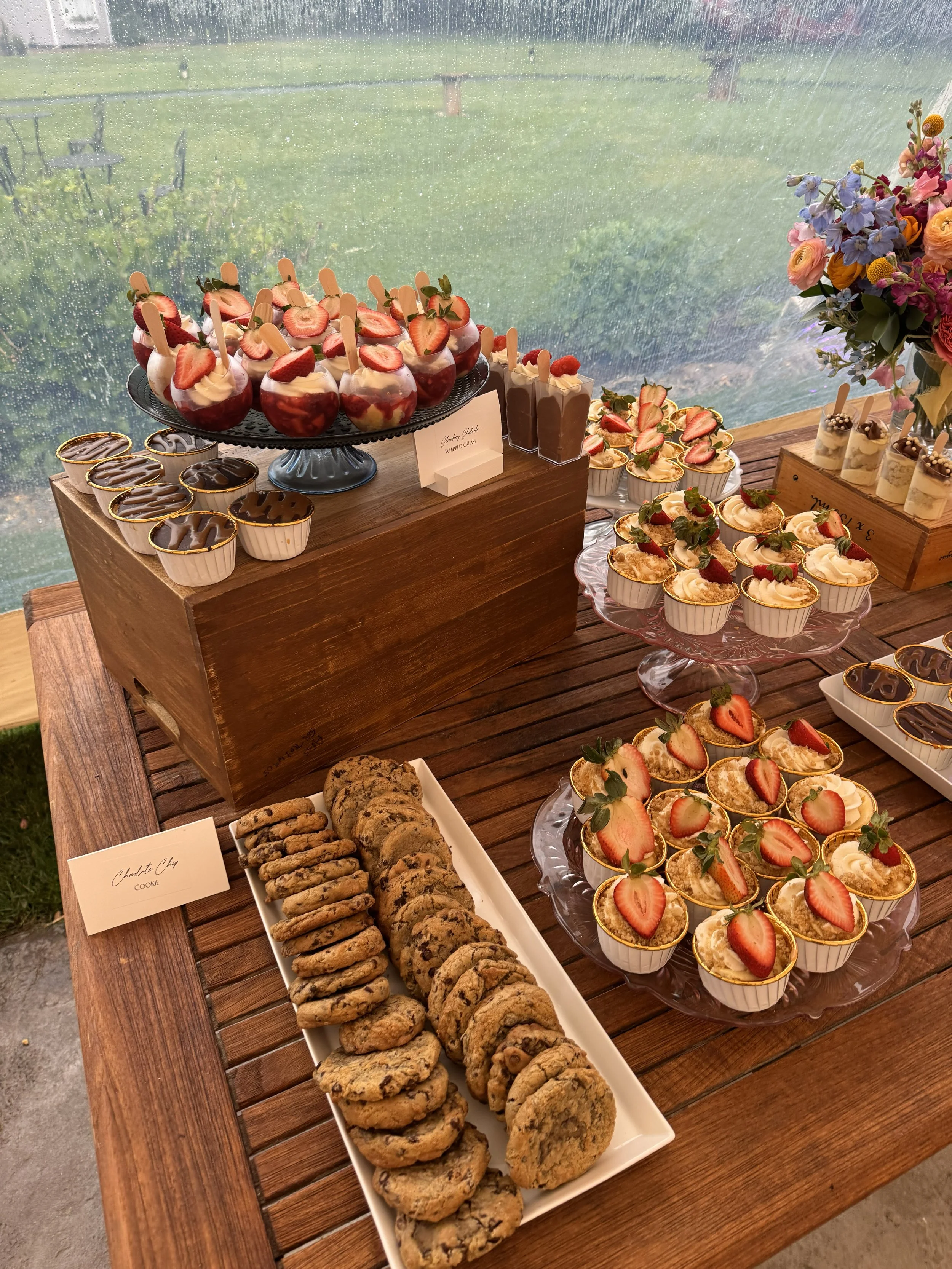 summer desserts for a tented wedding at arch at the meadow on a farm wooden table cookies and cheesecakes desserts guests will eat plymouth county masschusetts homemade bakery dess.jpg