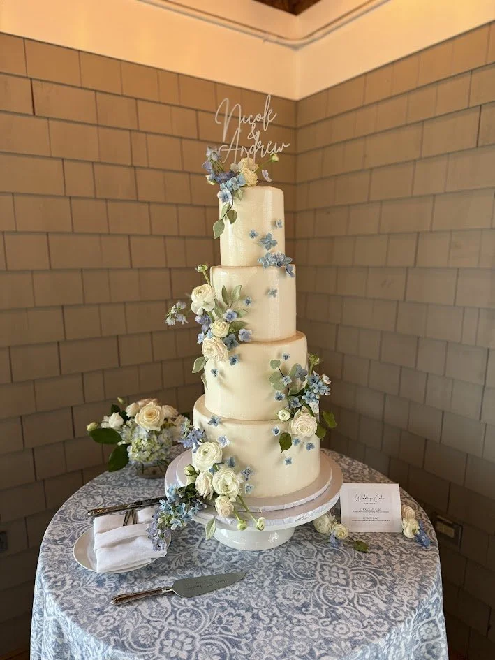 shining tides four tiered buttercream hydrangeas white flowers.jpg
