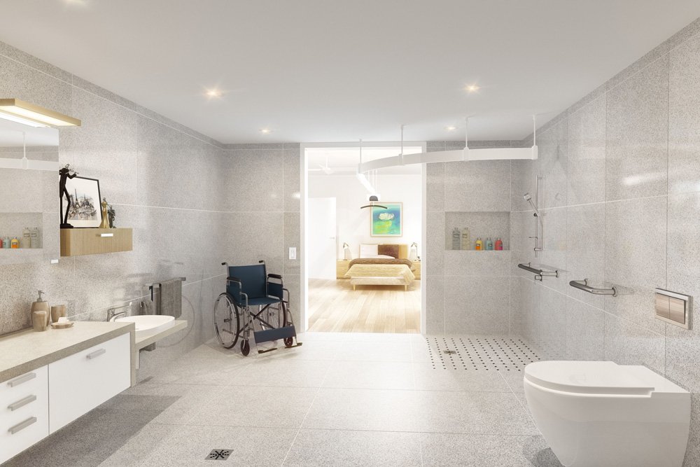 A spacious, modern bathroom with light-colored tiled walls and floor. It features a wheelchair, a sink with toiletries, a shower area with grab bars, and a toilet. The bathroom opens to a bedroom with a bed, artwork, and colorful decor visible in the background.