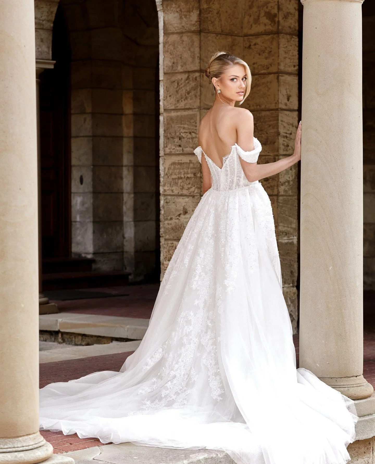 The perfect overskirt to walk down the aisle in.⁠
⁠
Our Sienna gown. 🤍