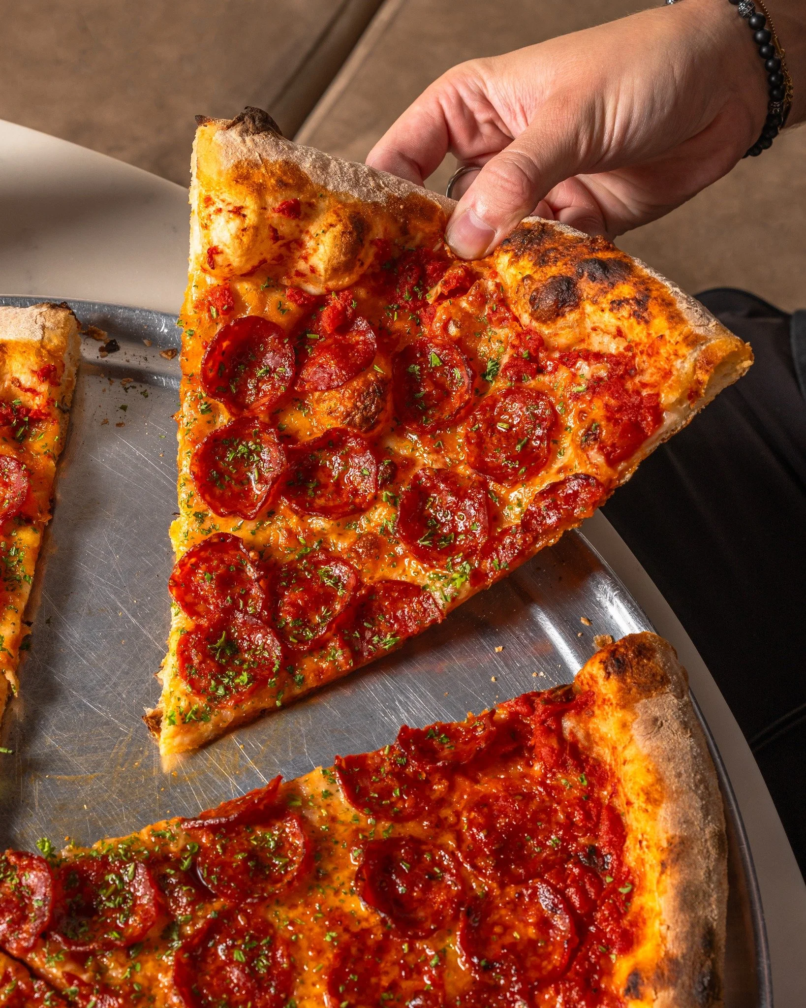 The weather today is a bit British,  isn't it? ☁️ Here are some of our beautiful slices to brighten up your day! ☀️ We are slingin' slices till late, daily! 🍕