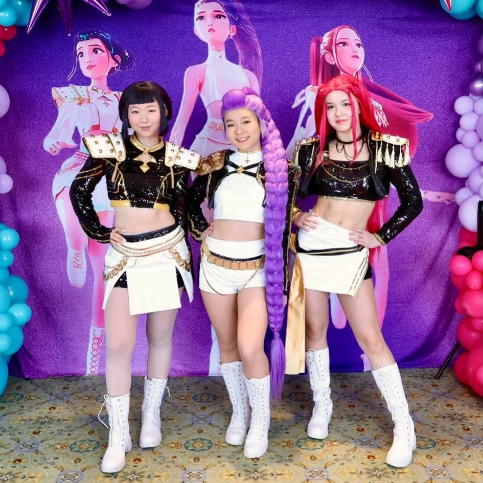 Huntrix is available for birthday parties and events in Dc, Maryland, and Virginia! 

💜 Who&rsquo;s your favorite Huntrix member? Comment Rumi, Zoey, or Mira below! 

⚔️ Fill out our booking form in bio or head to our website for more info. glasspal