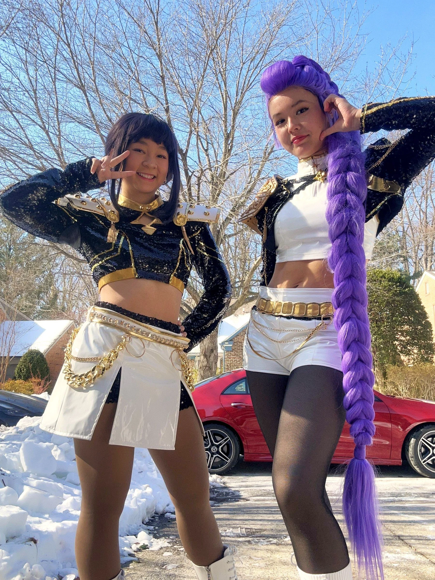 Two K-Pop dancers striking idol poses outdoors in Maryland