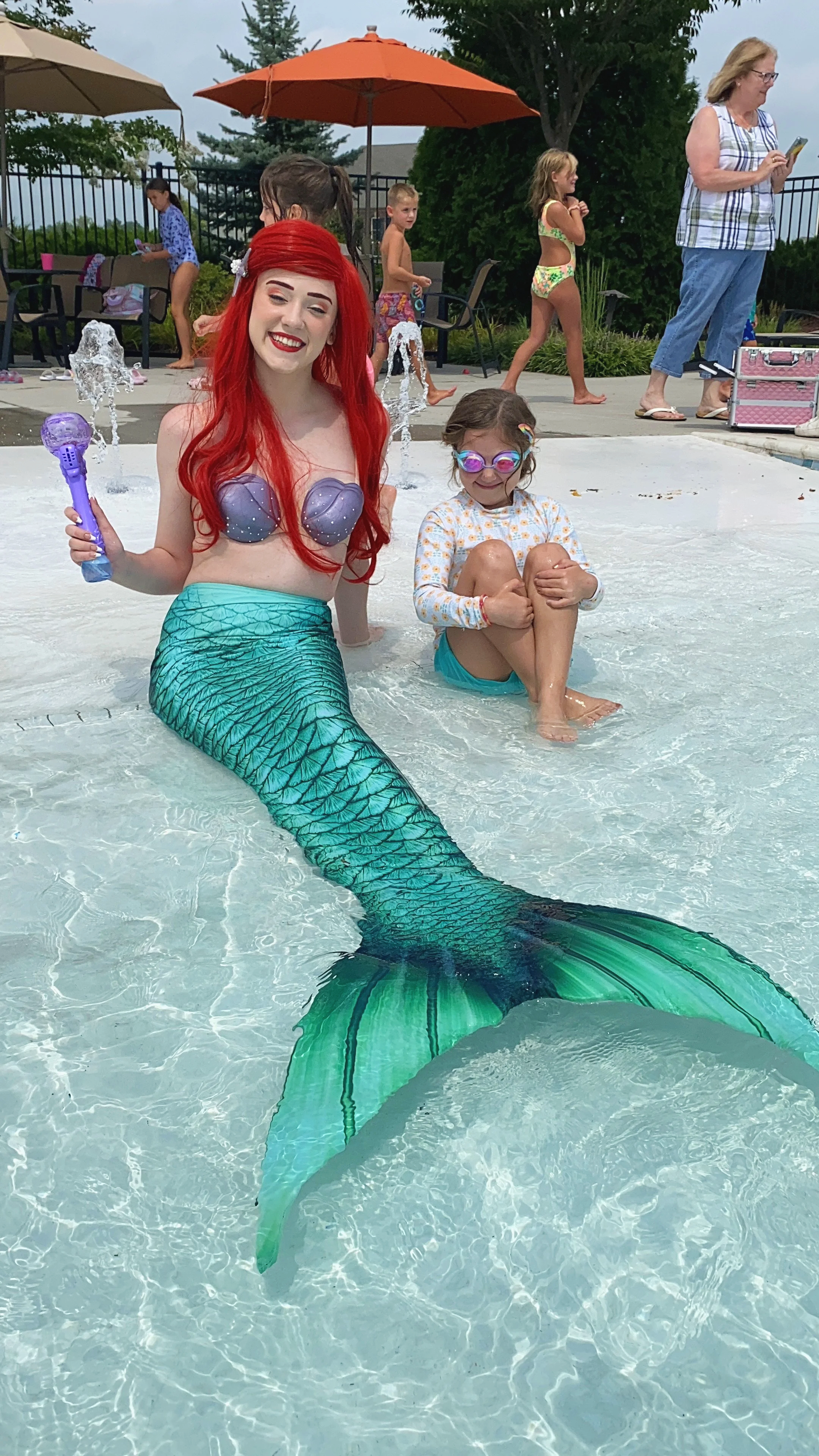 Ariel swimming at pool party in Maryland