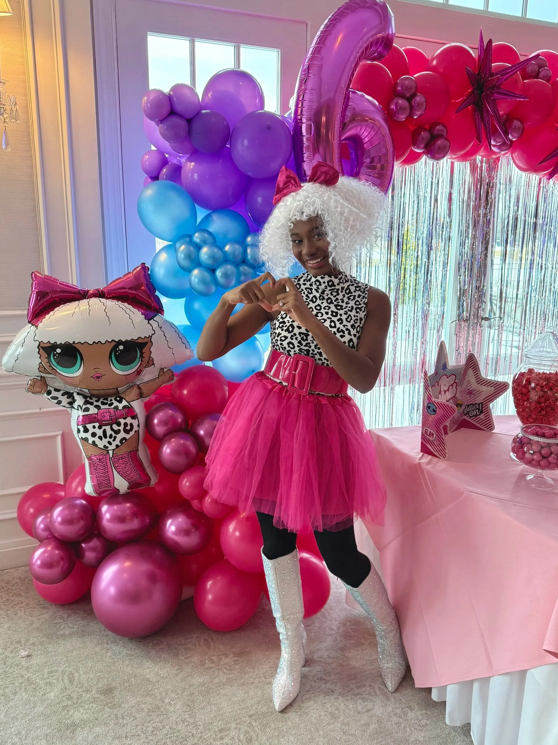 Fashion LOL Doll Birthday party character with LOL doll in backdrop decorations