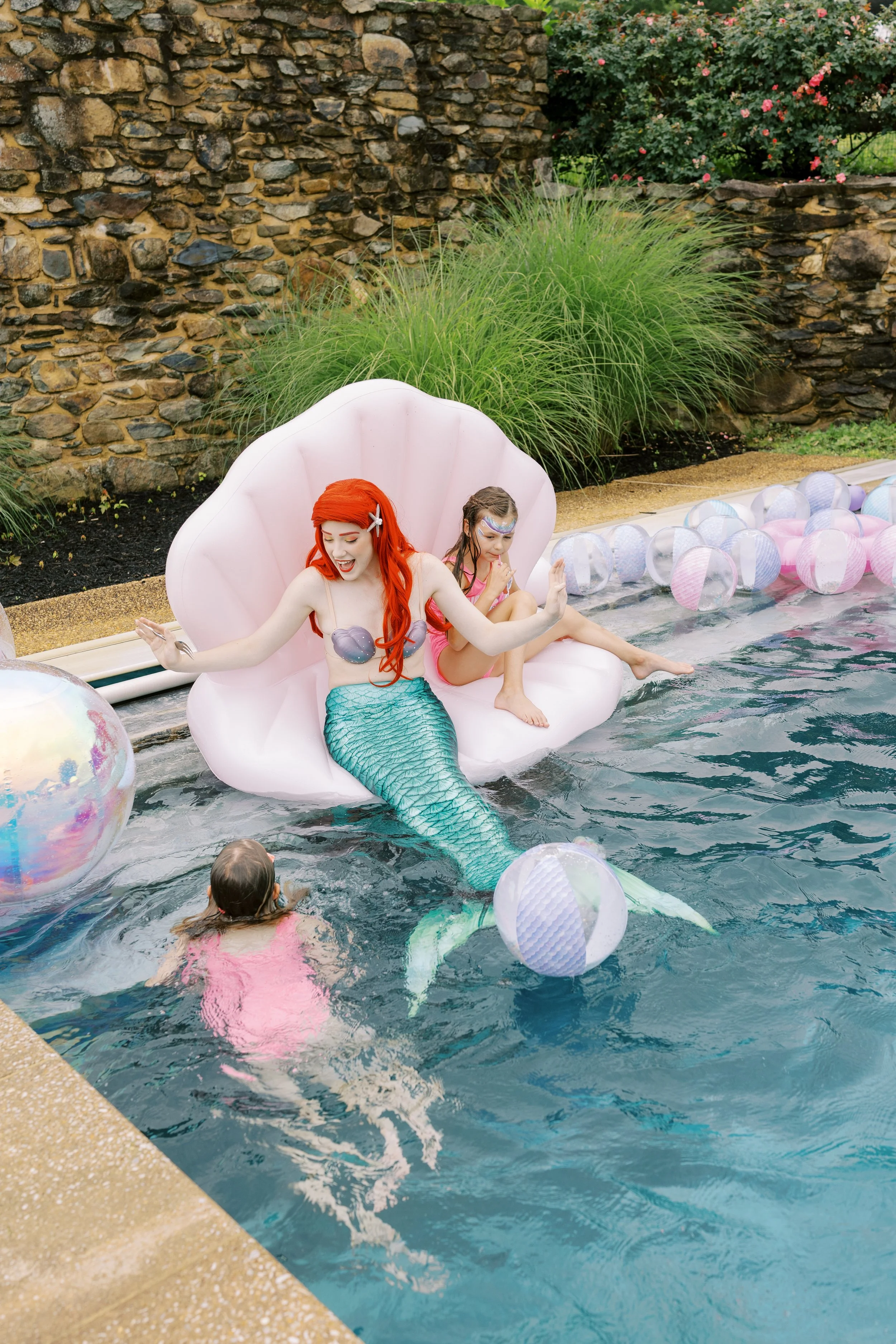 mermaid on sea shell floatie .jpg
