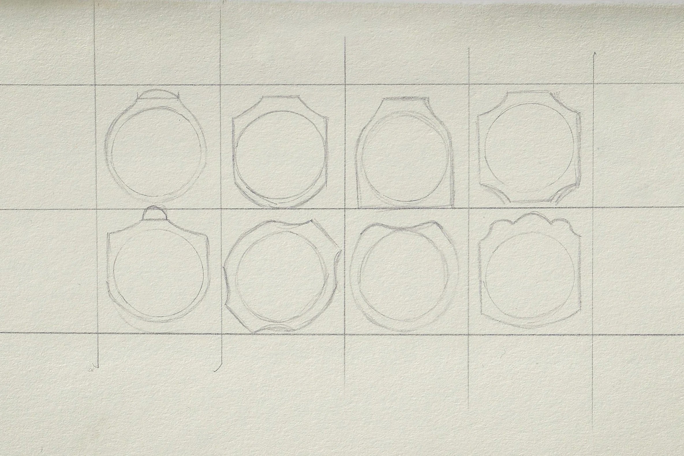 A pencil sketch of various hollow ring designs from emily georgina jones jewellery outlined on graph paper.