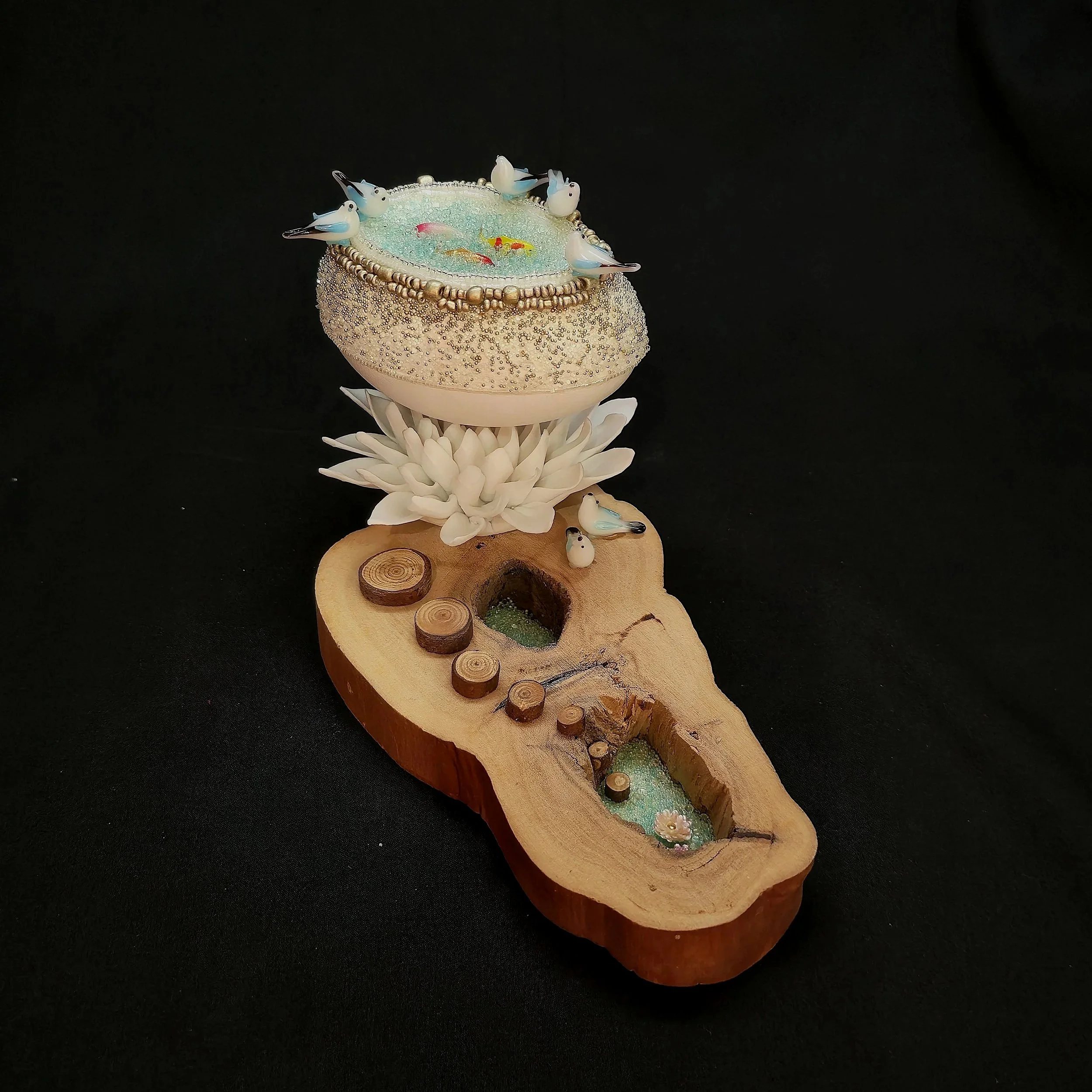 "I've Been Pondering" - $400 - 7 1/2"l, 4"w, 4"h - Natural goose egg