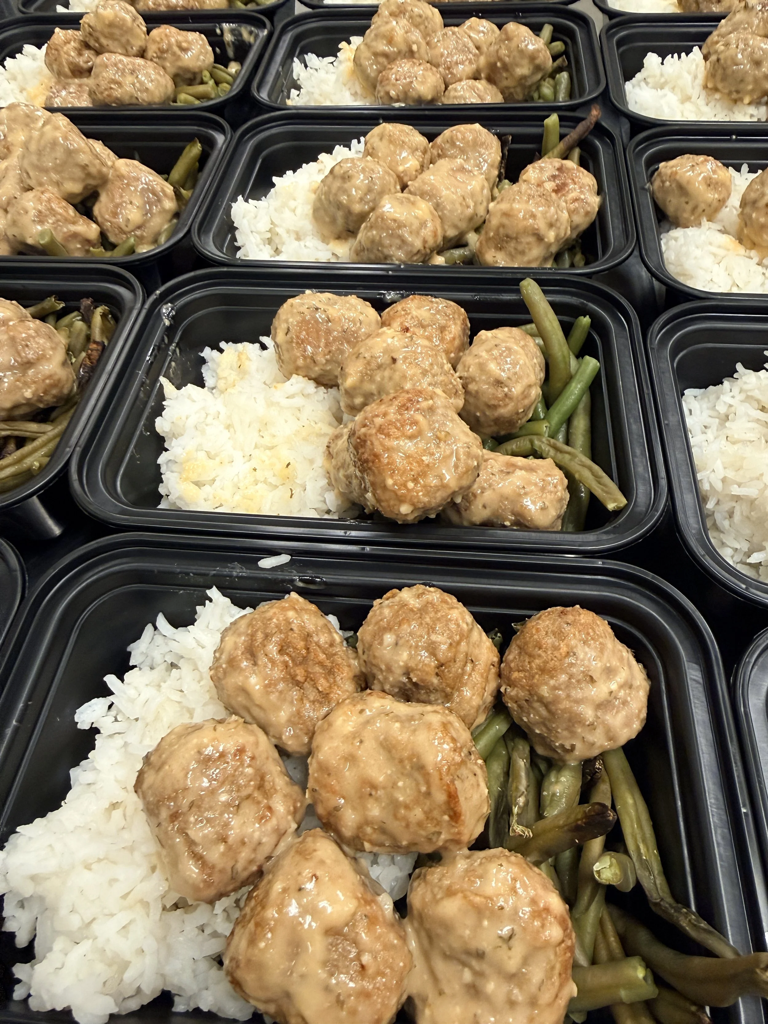 Garlic Parmesan chicken meatballs with oven roasted green beans and your choice of side