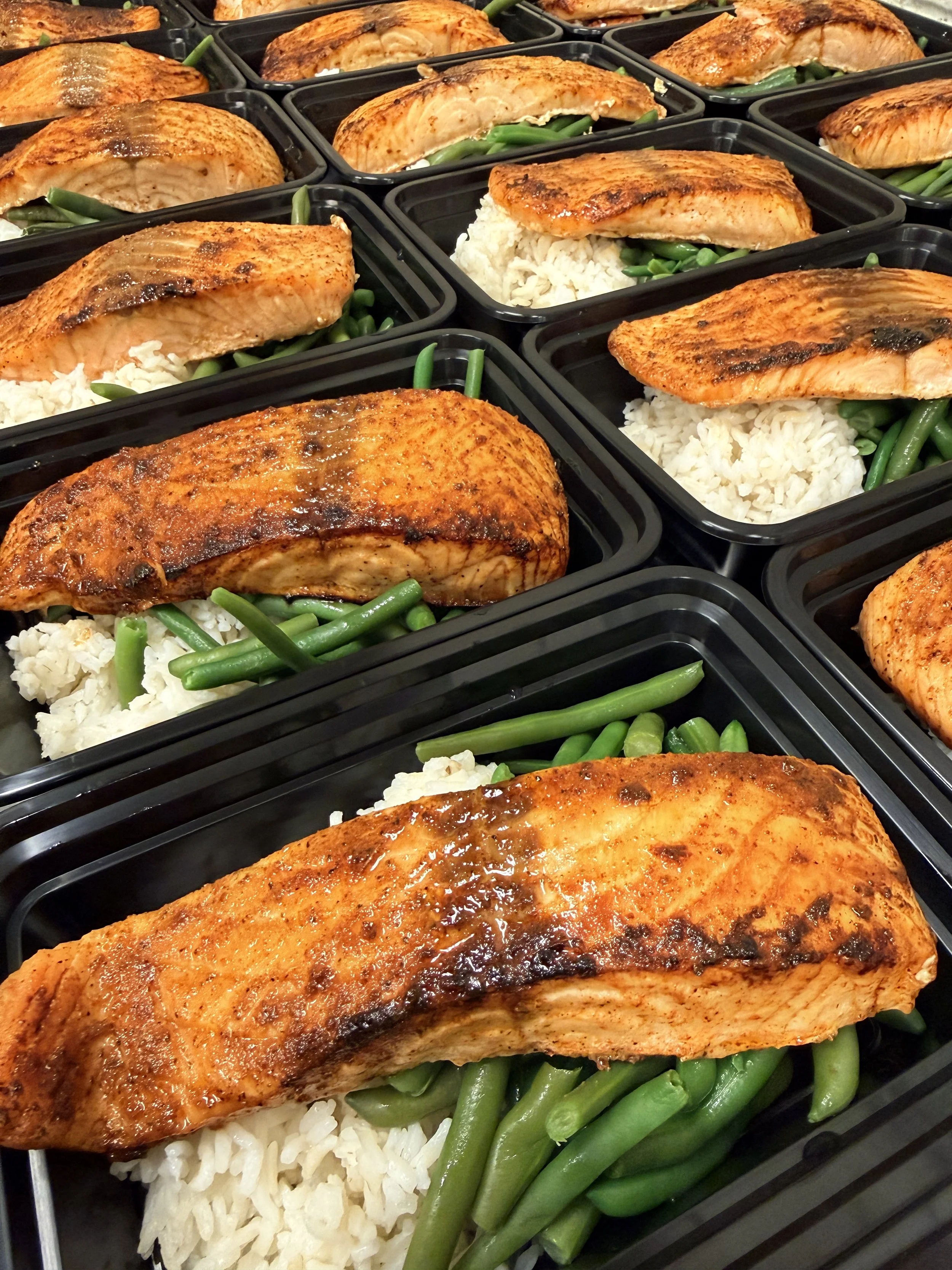 Blackened  salmon with green beans and your choice of side.