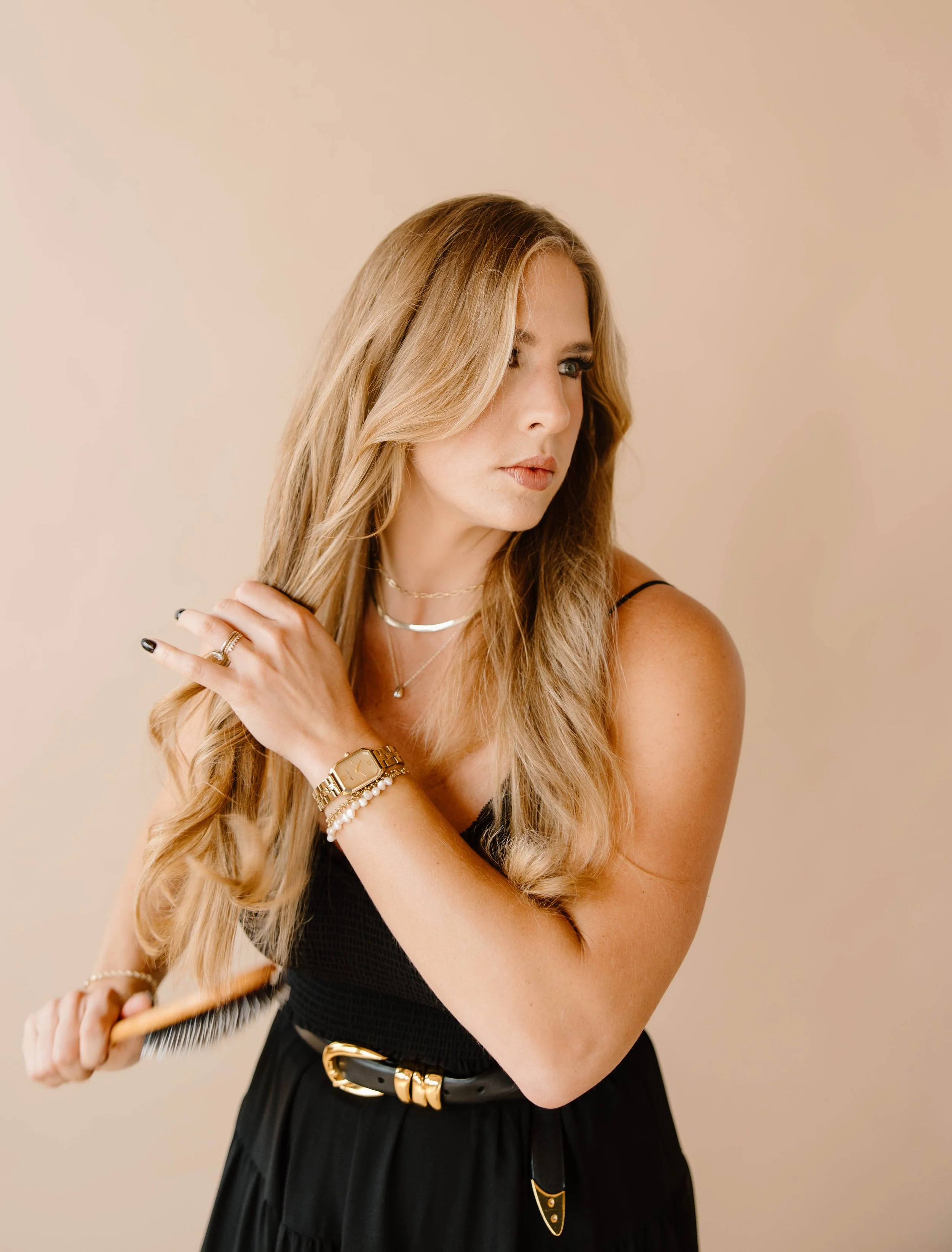 Textured waves hairstyle paired with summer outfit Byron Center salon inspiration