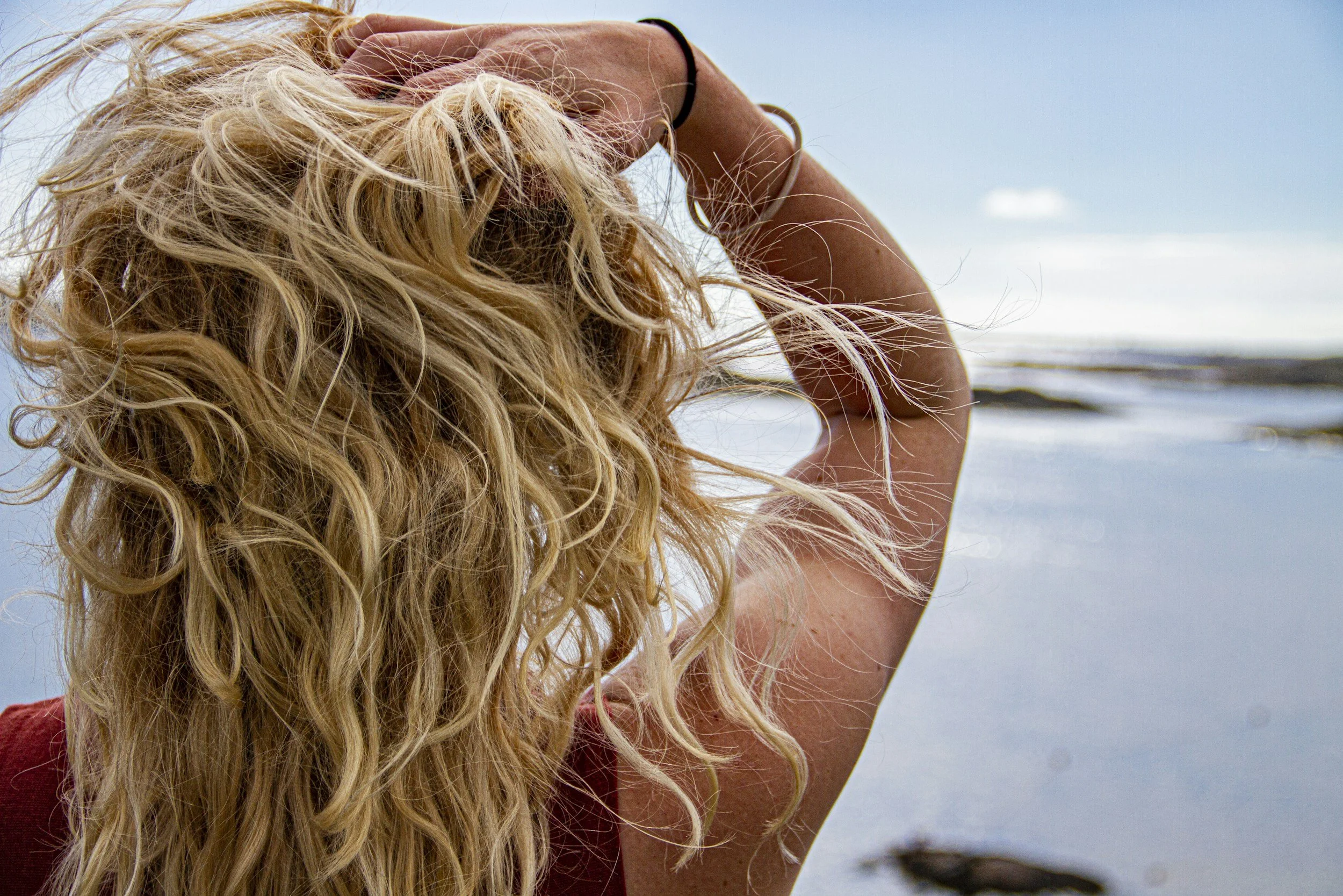 Healthy summer hair maintained with professional hair care products