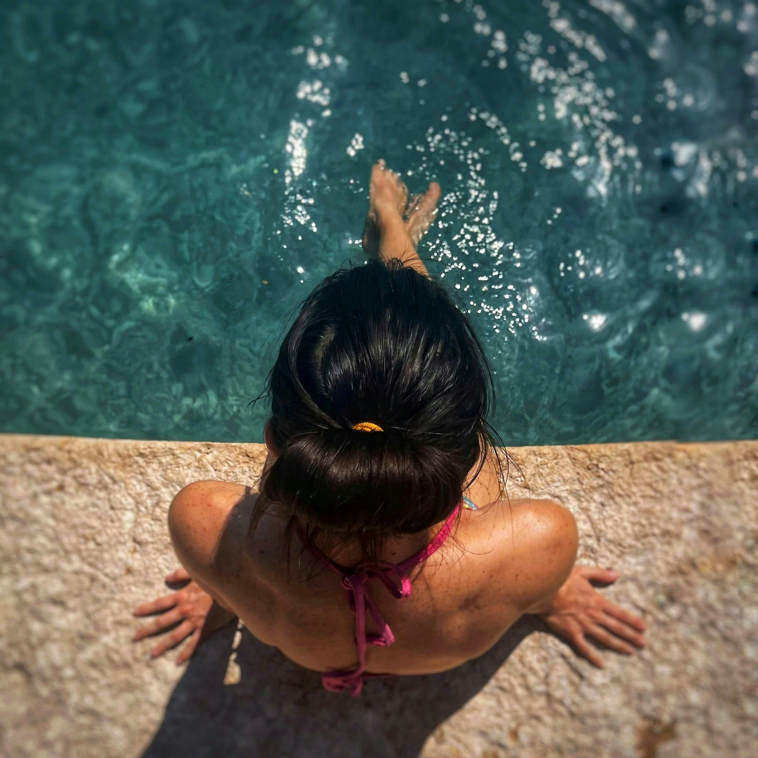 Leave-in conditioner used to protect hair from chlorine and sun exposure