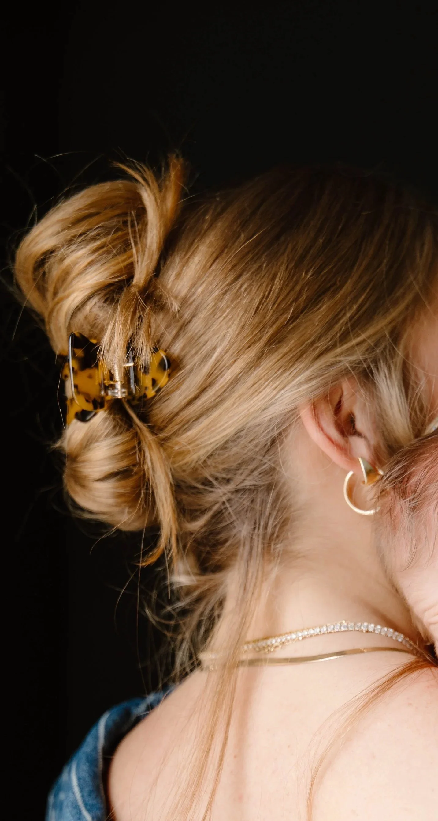 Summer hairstyle featuring a claw clip and soft texture