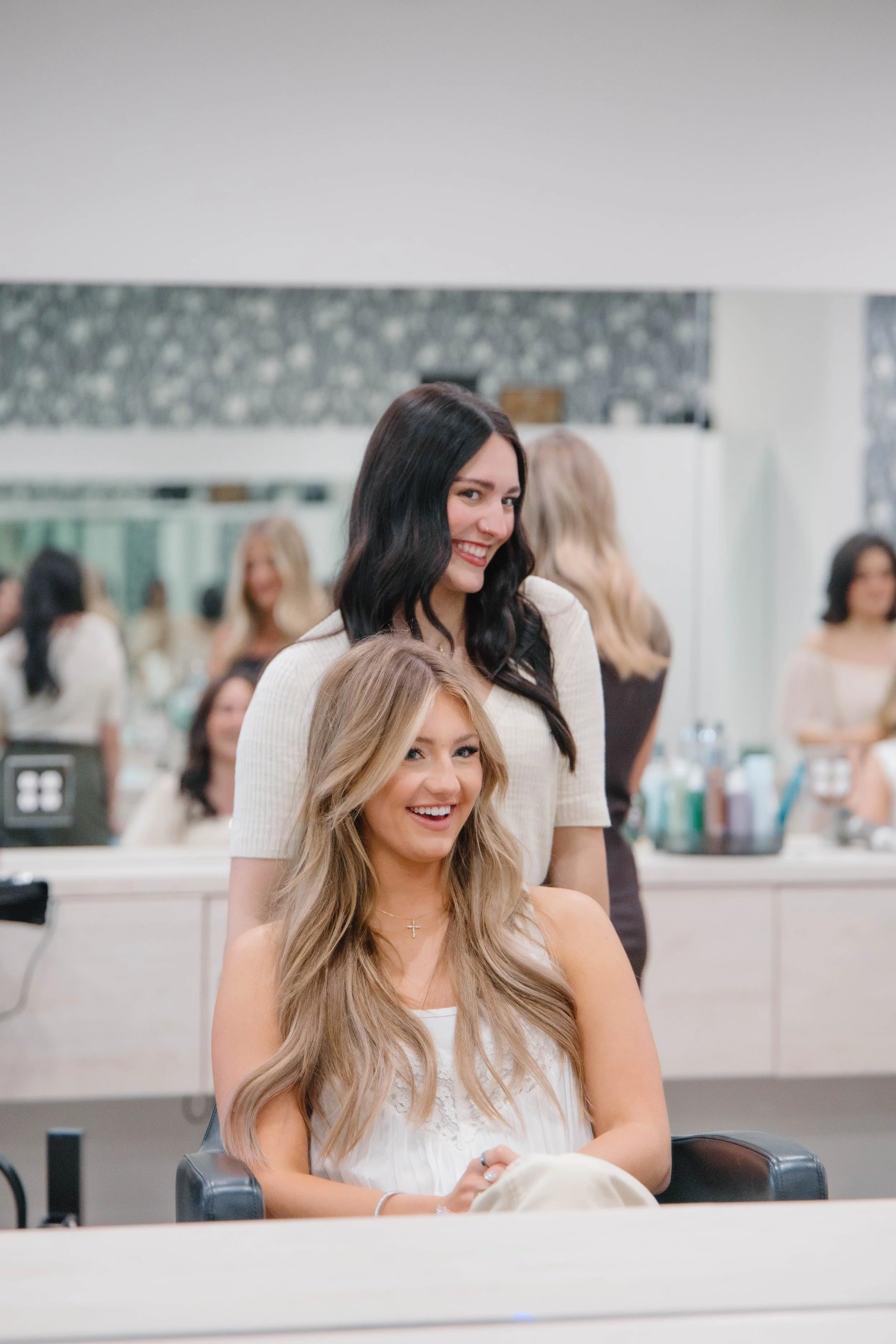 Haircut consultation with stylist at Cedar Rose Salon & Suites