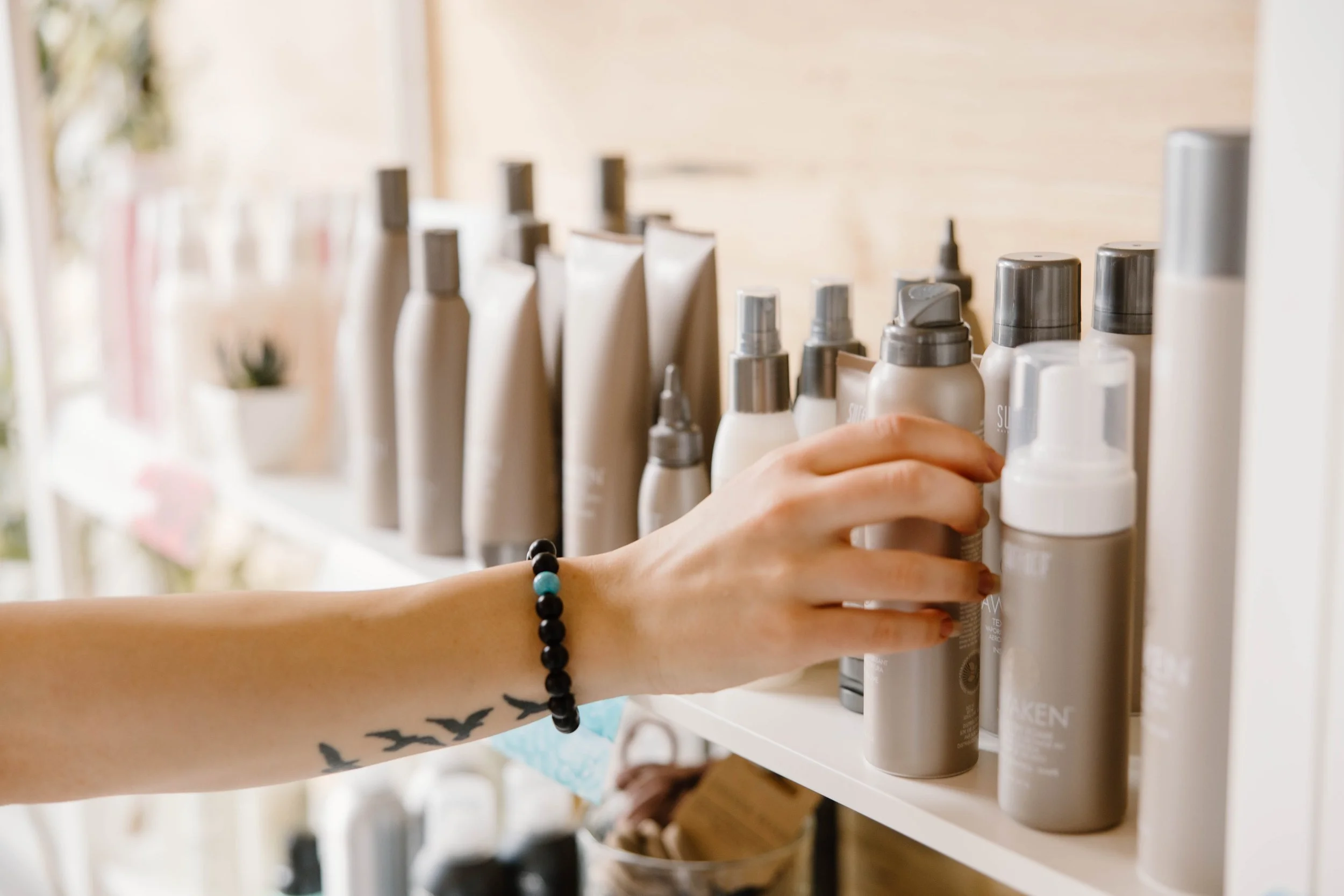 Professional scalp health products displayed in a salon setting in Byron Center, Michigan