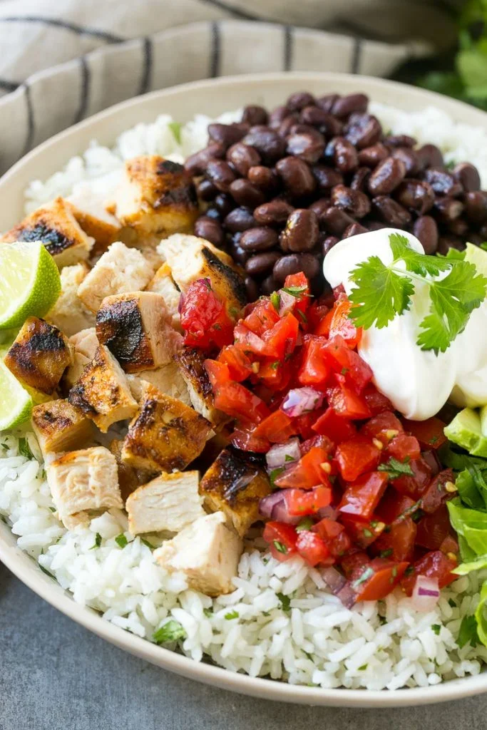 Chicken Burrito Bowl w/ Cilantro Lime Cauli Rice, Black Beans, Diced Tomatoes & Pineapple Salsa