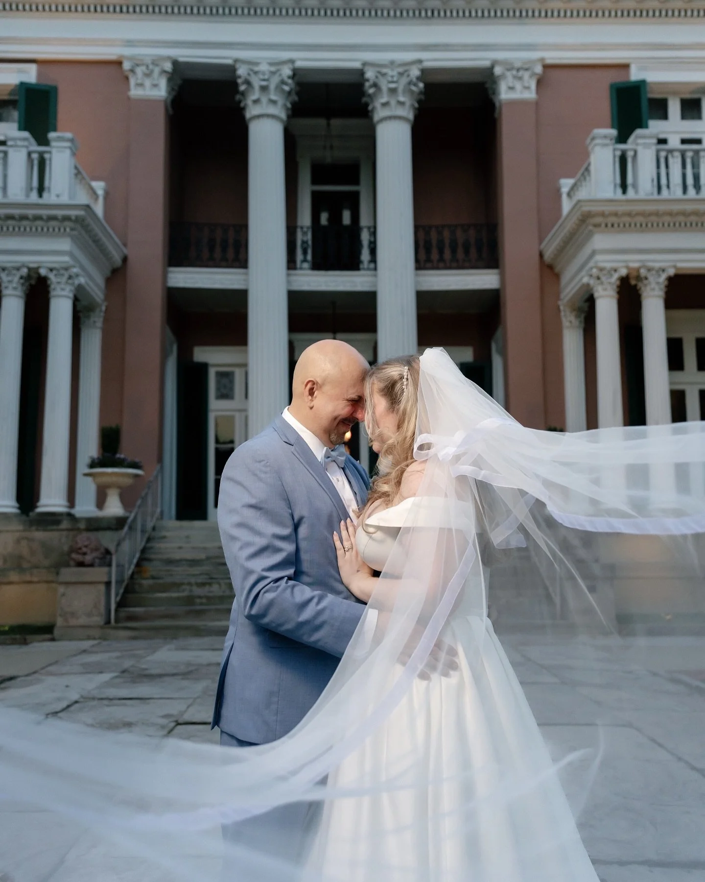 This gorgeous elopement at Belmont Mansion perfectly blended grandeur and intimacy. We adored capturing the pure joy on their faces as they descended the steps of the mansion, the romantic swirl of her veil during their tender embrace, and even the f