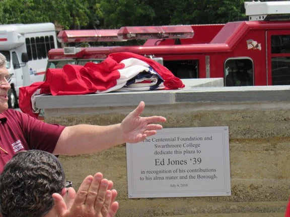A dedication ceremony in 2016 featuring a plaque dedicating the Swarthmore Central Park plaza to Mr. Jones.
