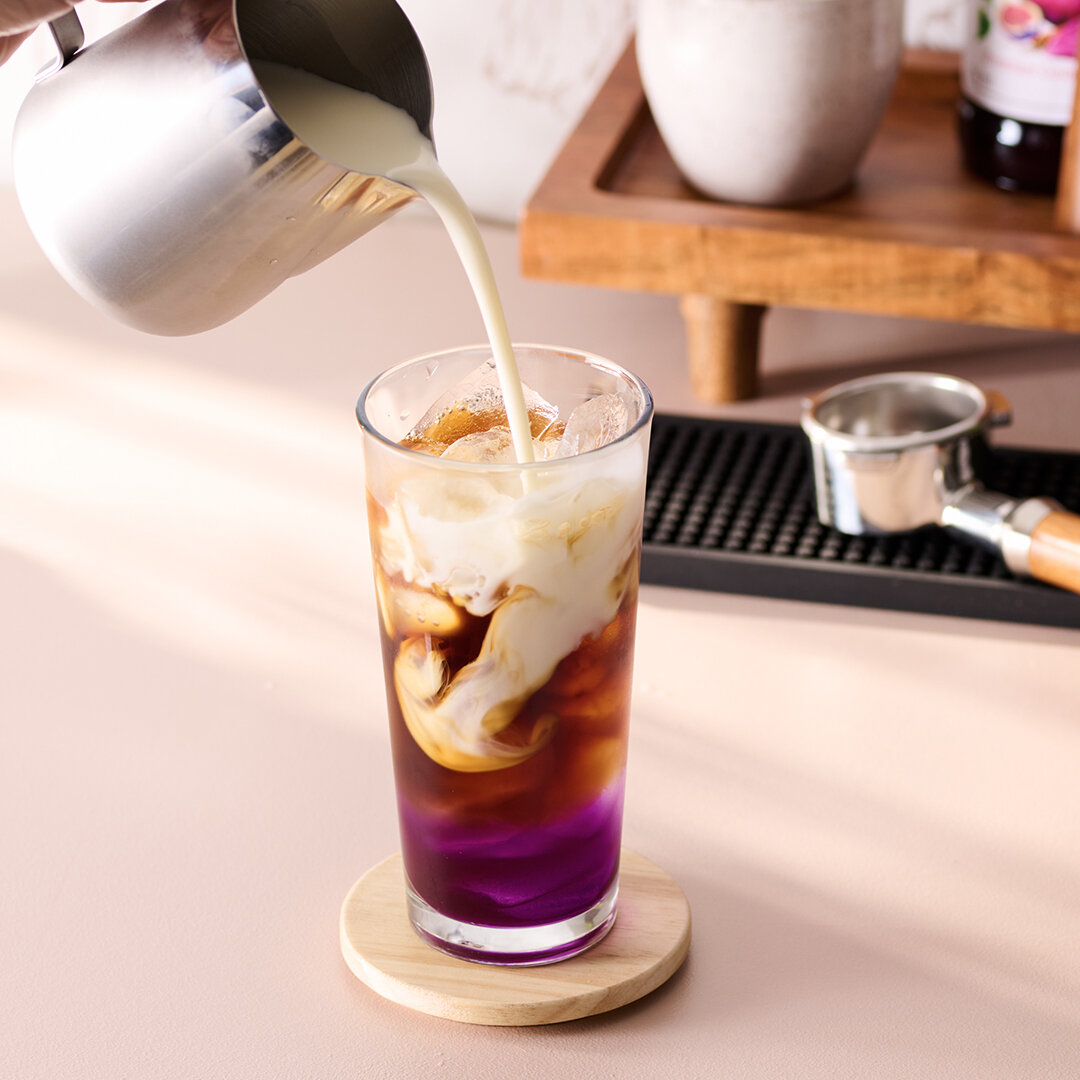 Pour in the purple with the @monin_usa 2024 Flavor of the Year, Ube! Monin Ube Syrup is blended with notes of fig, cinnamon, and vanilla for a unique twist on traditional ube flavor&mdash;perfect for crafting unforgettable specialty coffee drinks and