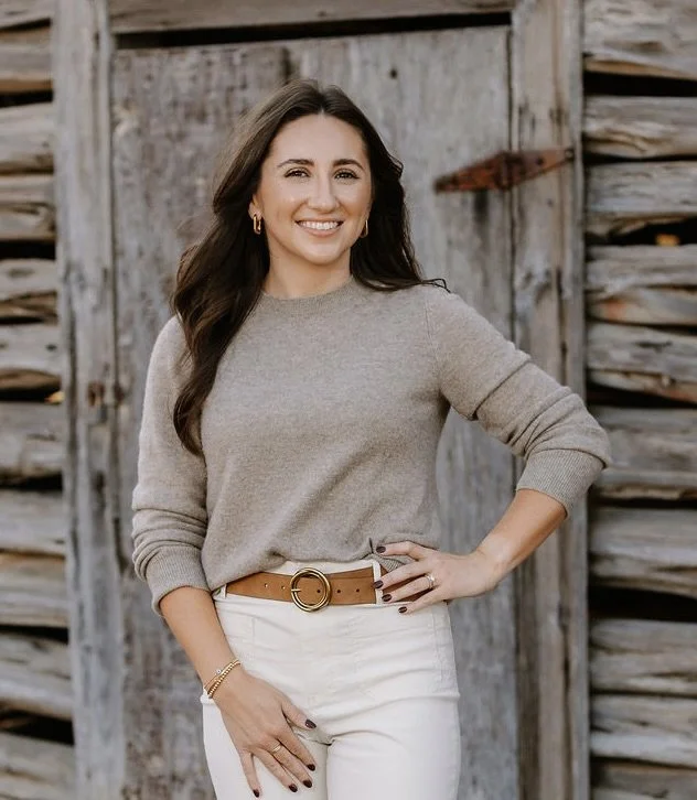 Bailey Rowat, Austin Realtor®, posing outdoors in a professional headshot, showcasing a warm, approachable style and local real estate expertise in Austin, Texas.