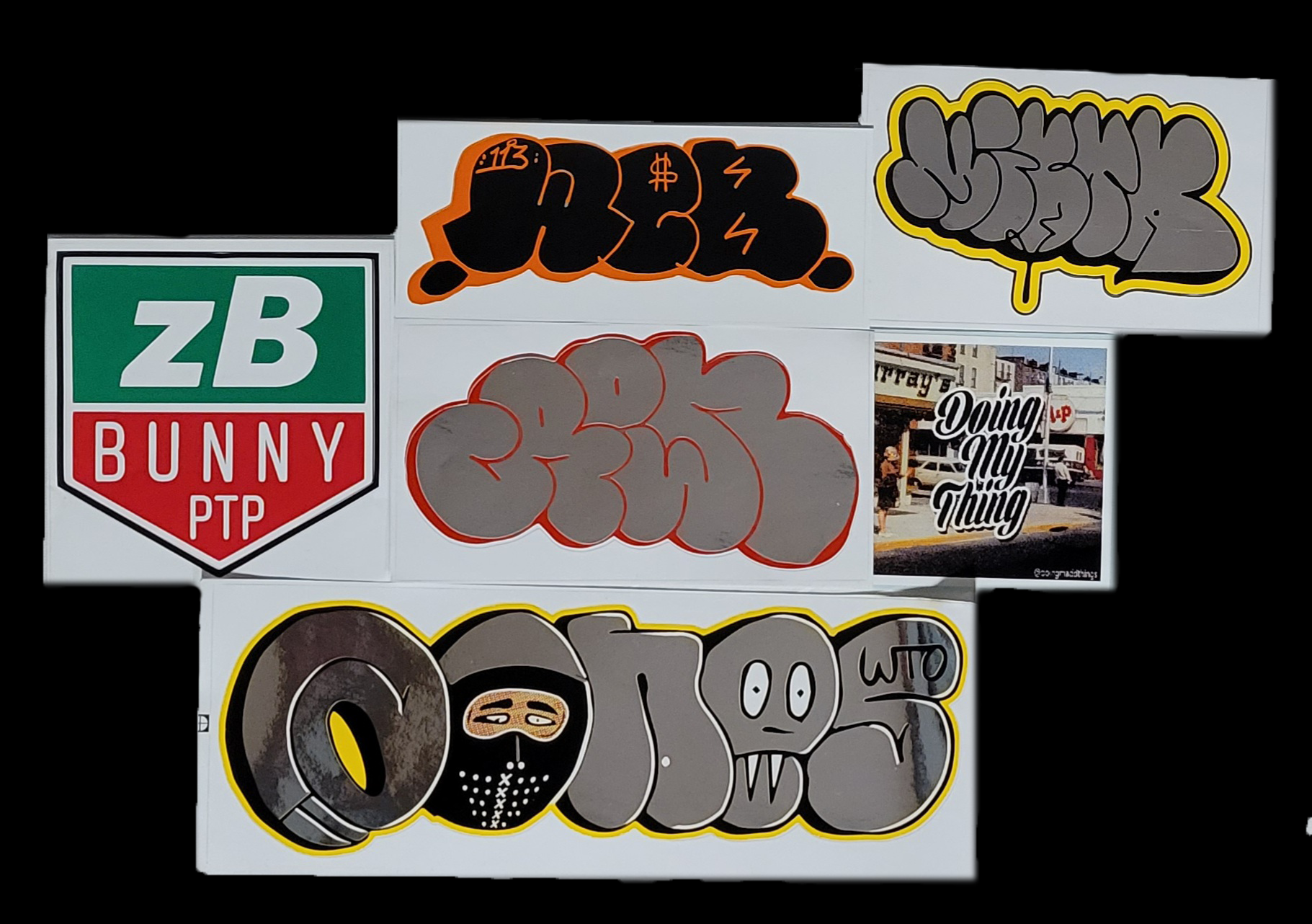 Various graffiti-style stickers featuring bold text and designs, including a "zB Bunny PTP" emblem, colorful lettering, and a sticker with the phrase 'Doing My Thing' showcasing a street scene.