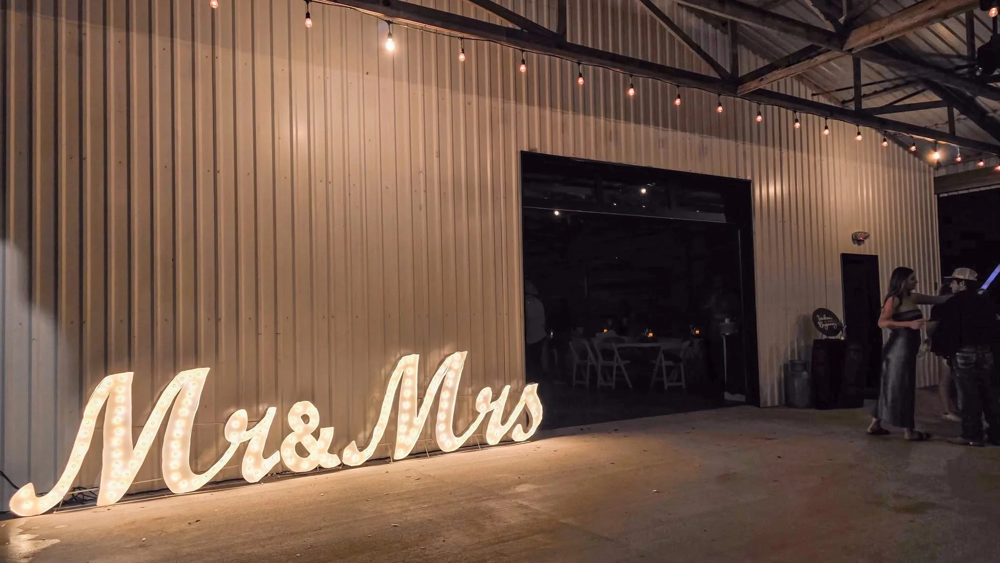 Mr & Mrs Lighted Sign night view 2025.JPG