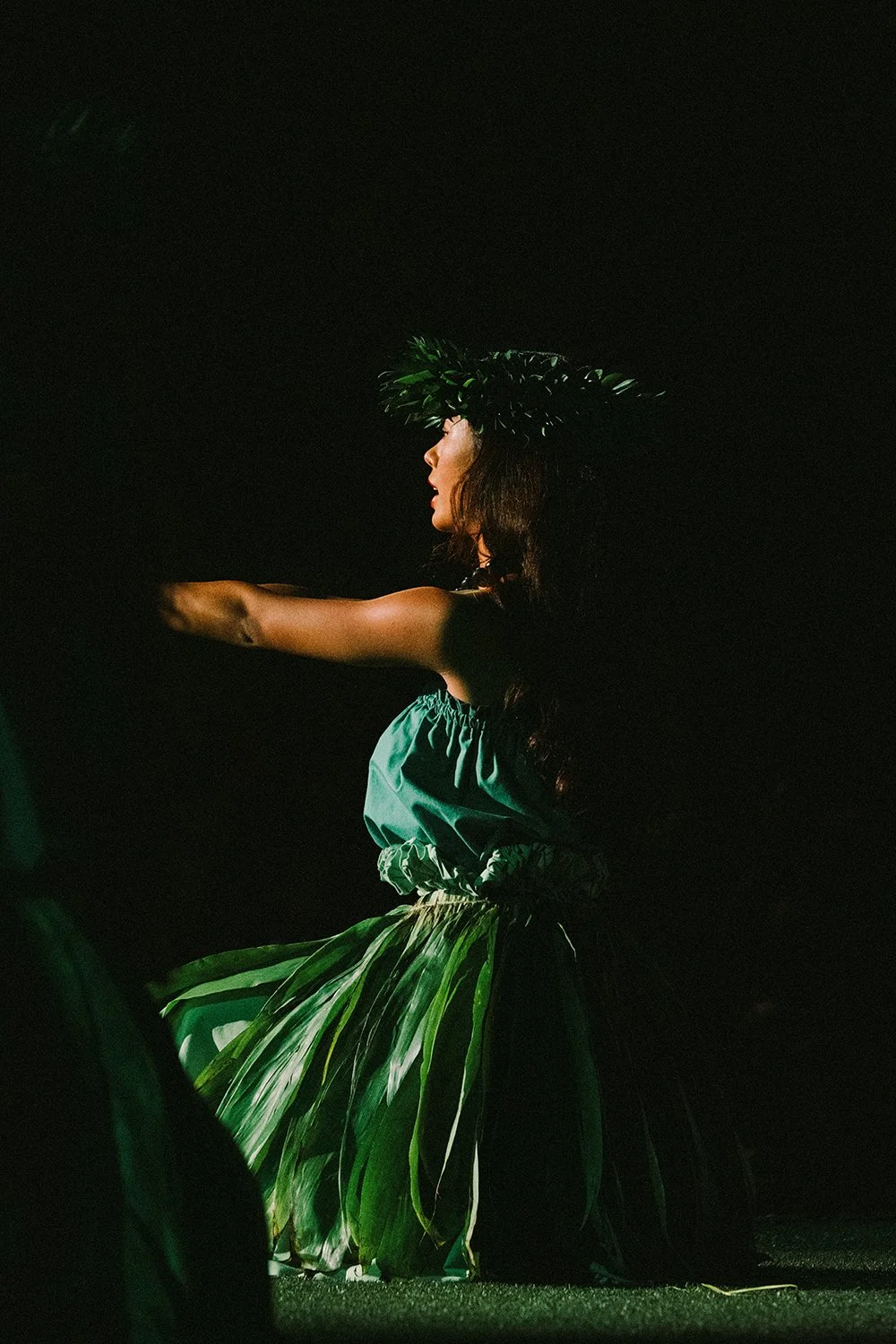 Hula Dancer at Old Lahaina Luau, Maui, Hawaii. Photograph by Daeja Fallas for Travel and Leisure