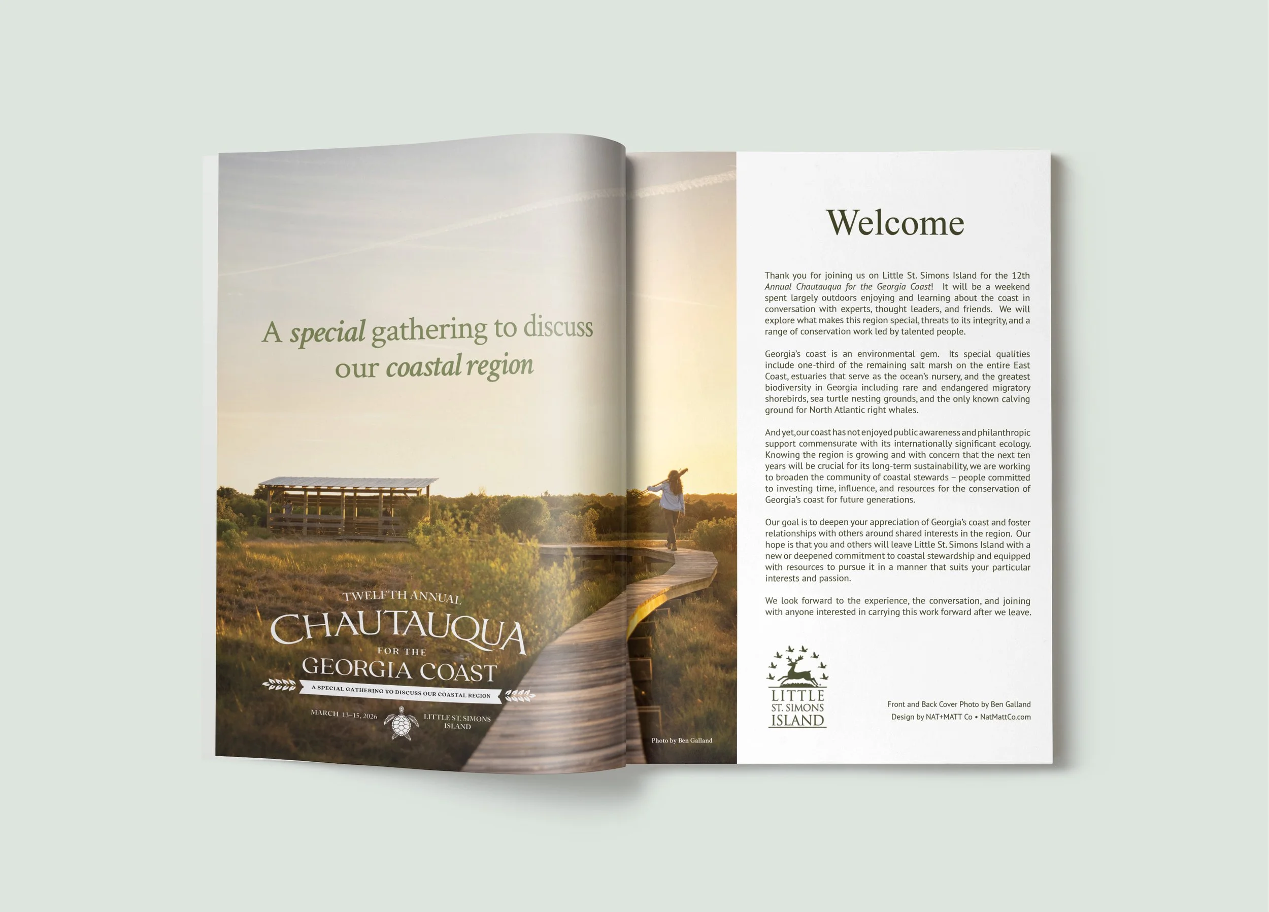 Open conference brochure with a scenic coastal landscape, a wooden walkway, and a person walking on it at sunset.