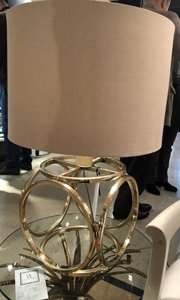 1970s brass geometric table lamp at original shade.
Price: $500