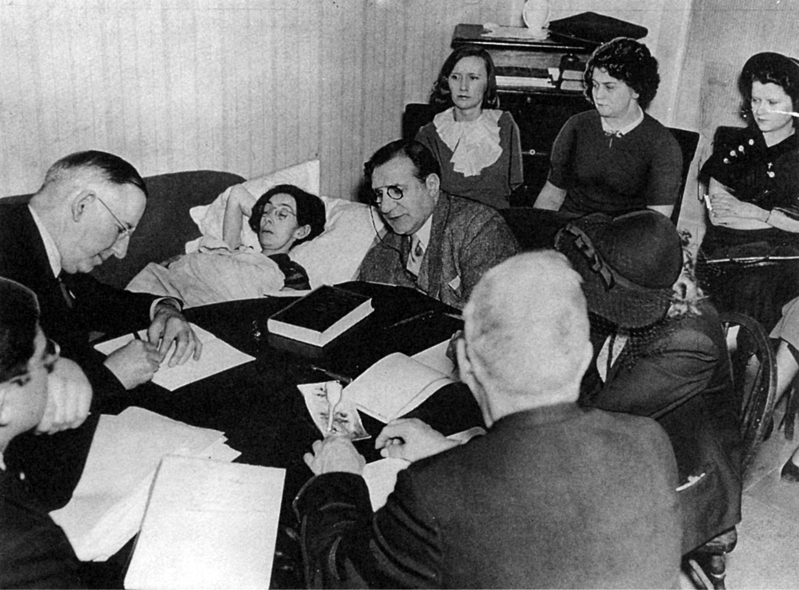 Catherine Donahue is surrounded by friends and family as she dies from radiation poisoning.