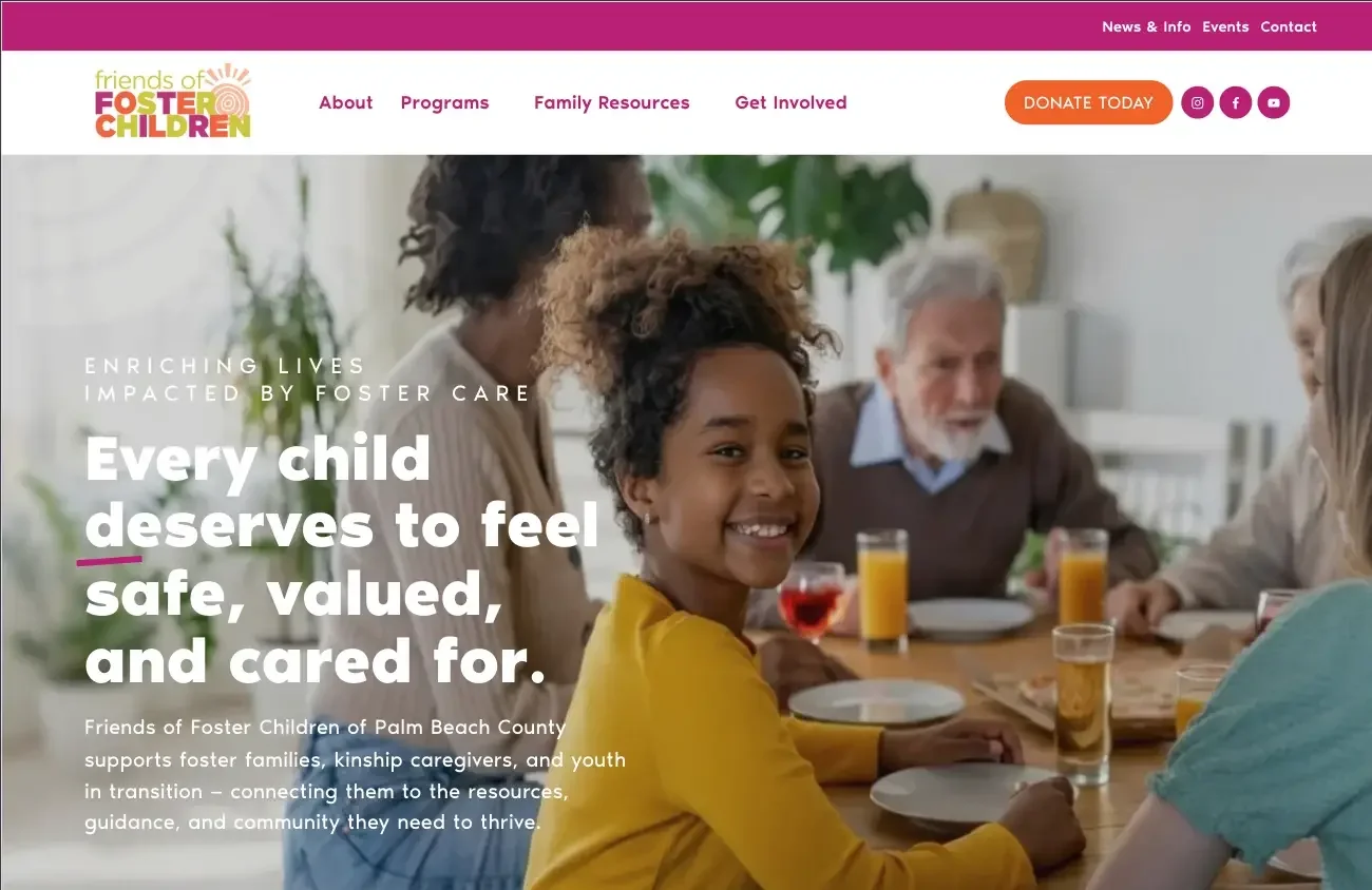 Friends of Foster Children Palm Beach Homepage with smiling young girl in yellow sweater at dining table with family, turned toward camera