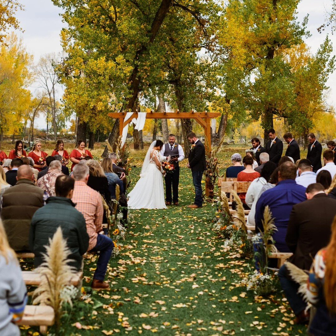 Love was in the air as this sweet couple said &quot;I do&quot; on a beautiful fall day. The leaves were vibrant colors creating an absolute stunning backdrop for their ceremony. 
As the father of the bride raised his glass to give a toast, he couldn'