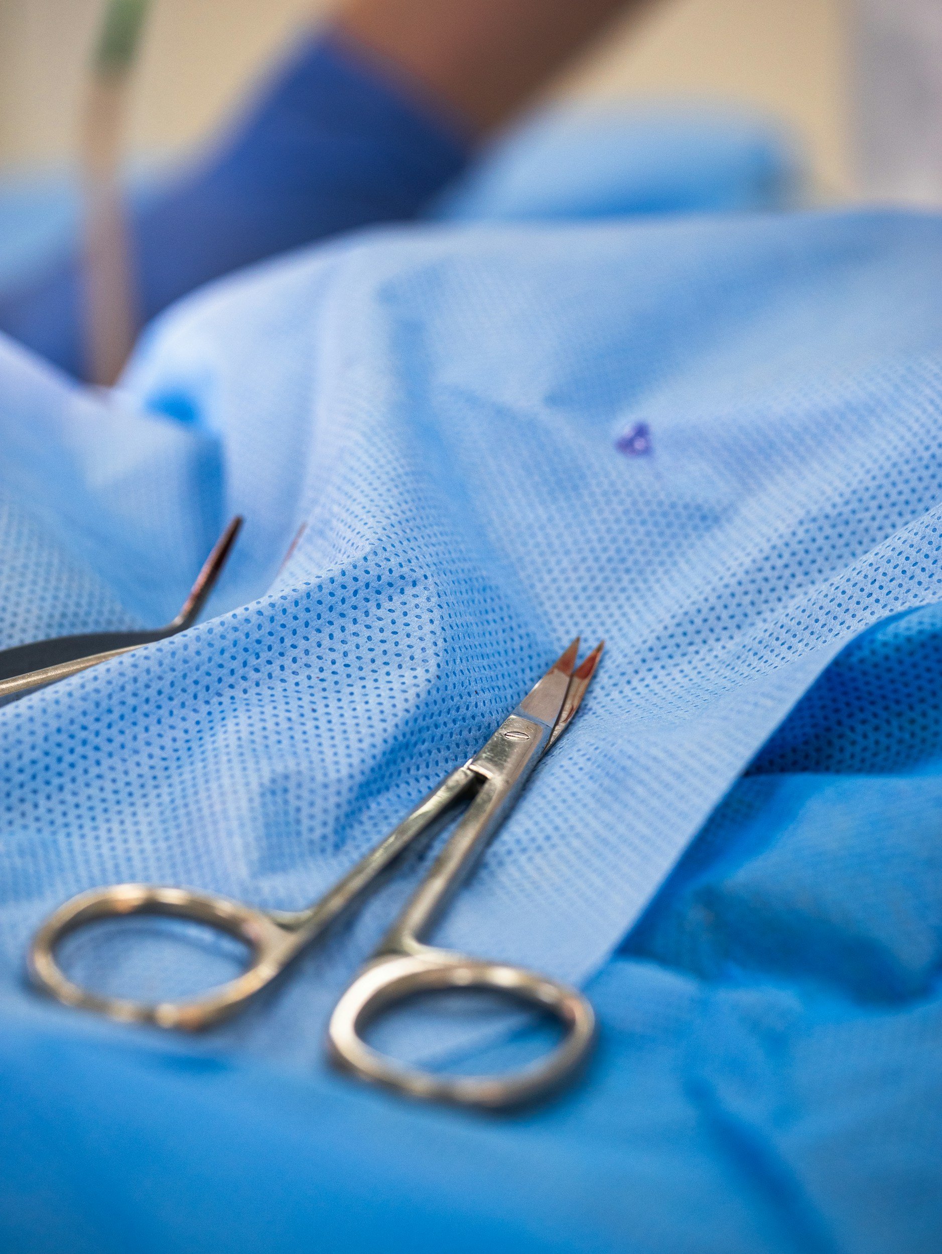 scissors on sterile surgical field