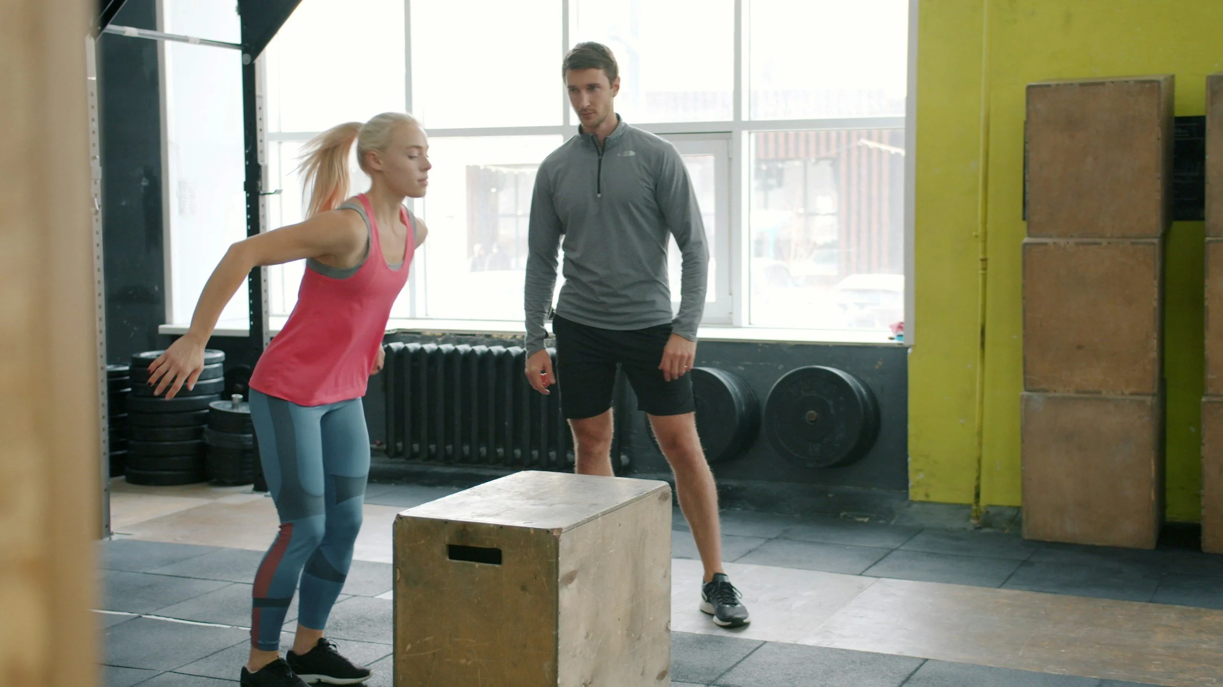 exercise physiologist testing a jump onto a box
