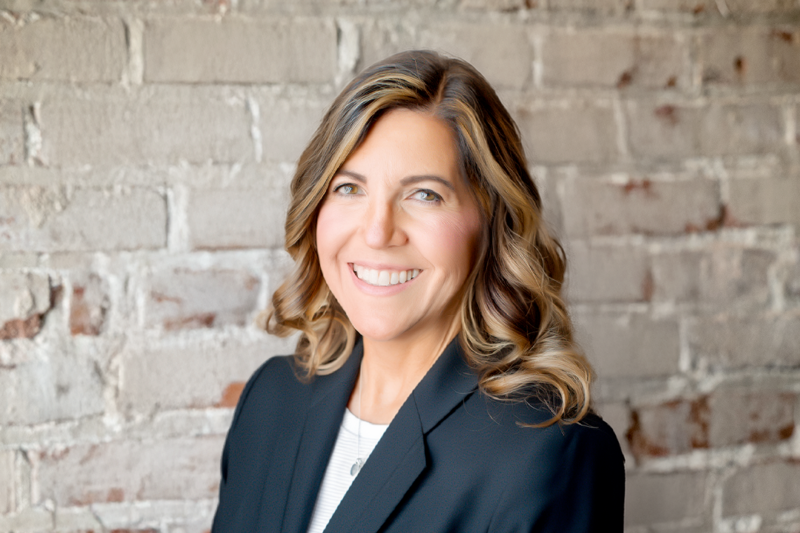 Tamara Burton with The Alms Group headshot 