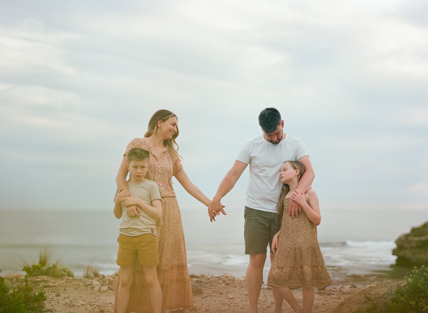 family together at the beach during family photography session Mornington Peninsula