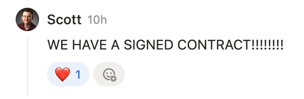 Screenshot of a LinkedIn message from Scott Phillips reading "WE HAVE A SIGNED CONTRACT!!!!!!!!" celebrating a new business deal sourced through social media